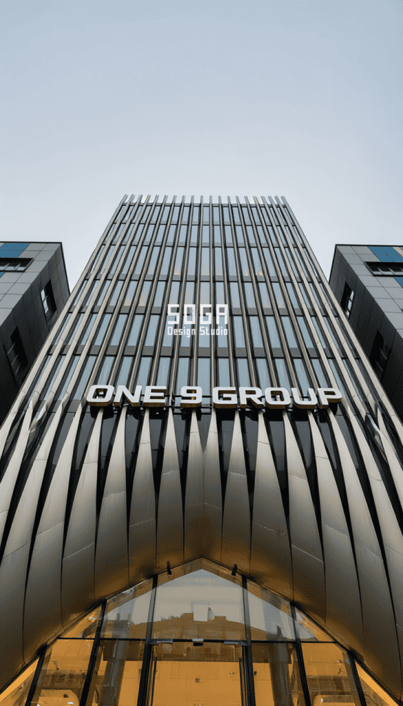 One 9 Group GIFT City: Redefining Corporate Architecture with Parametric Curved Fin Facade 2 Grand arched entrance of One 9 Group headquarters framed by curved vertical metal fins by SOGA Design Studio GIFT City creating dramatic arrival experience