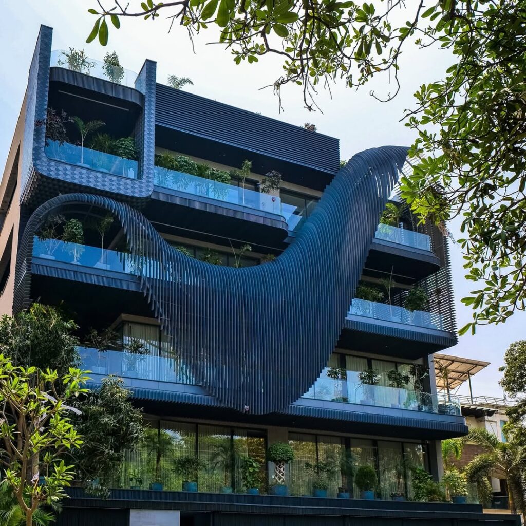 Residential Building Architecture with Fluid Wave Design. We design this residential building—with a fluid‐wave facade—as a sculptural fusion of art and engineering where every anodized alum