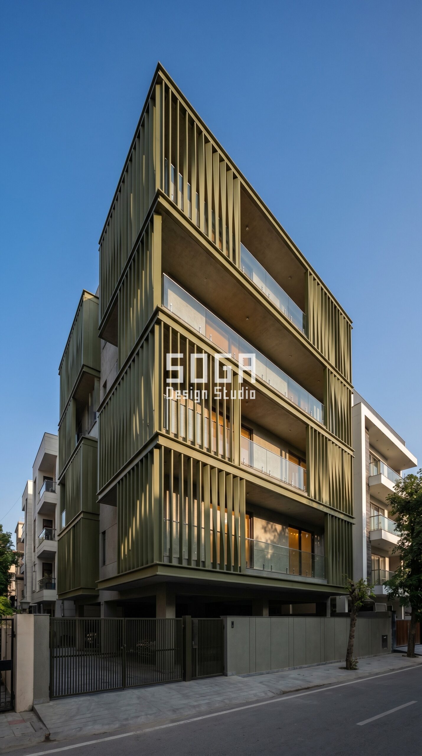 stacked interlocking box volumes with protruding metal fin screen elements parametric facade New Delhi — SOGA Design Studio