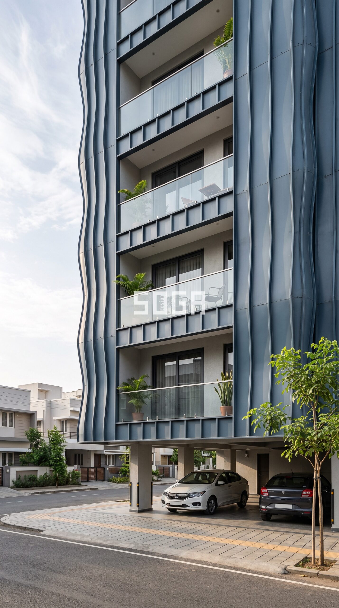 full height arched metal colonnade pattern wrapping the buil parametric facade Ahmedabad - SOGA Design Studio