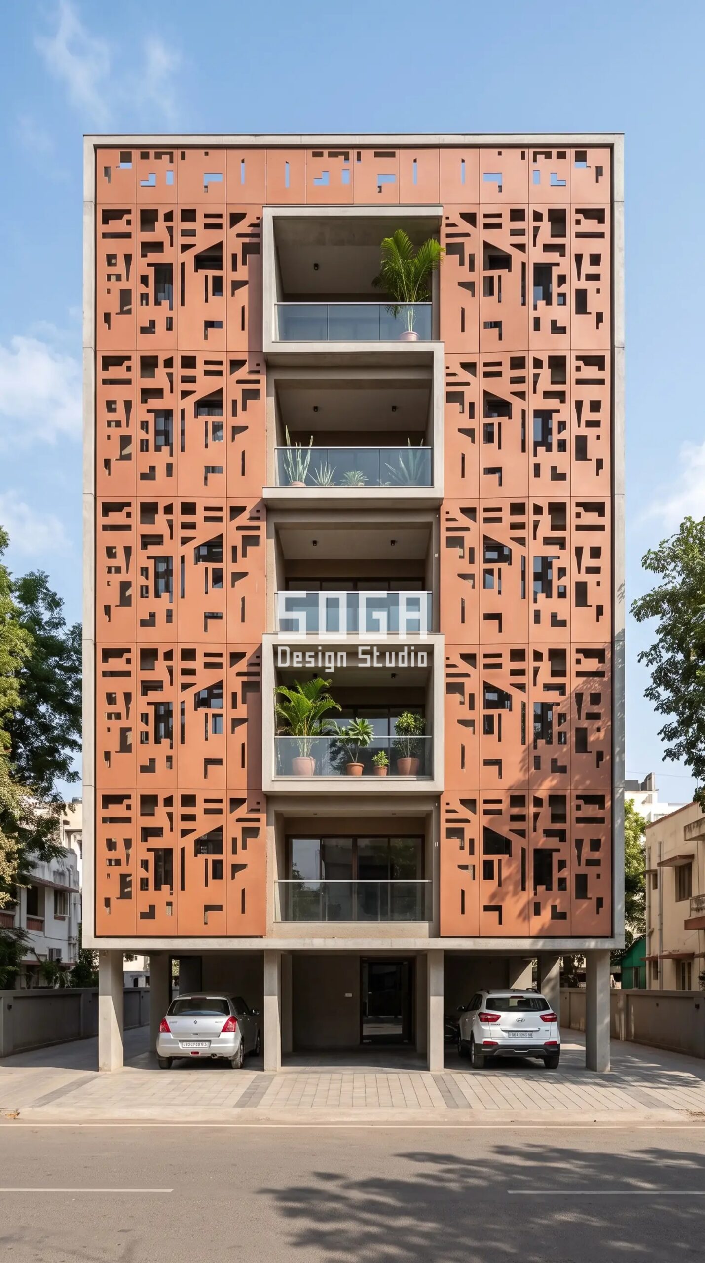 Facade Design in Ahmedabad & India 2026: Metal Facade Guide 2 Parametric Skyline Screen matte warm terracotta-toned metal composite panels facade Ahmedabad - SOGA Design Studio