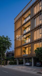 Parametric Reed Screen matte warm amber gold anodized aluminum panels facade New Delhi - SOGA Design Studio