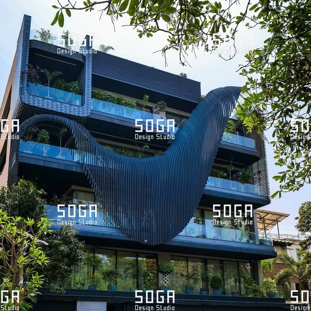 SOGA Slicing Fin Facade: The Complete Guide to Parametric Vertical Fin Systems 3 Slicing fin facade of vertical metal fins forming a wave across a building elevation in India