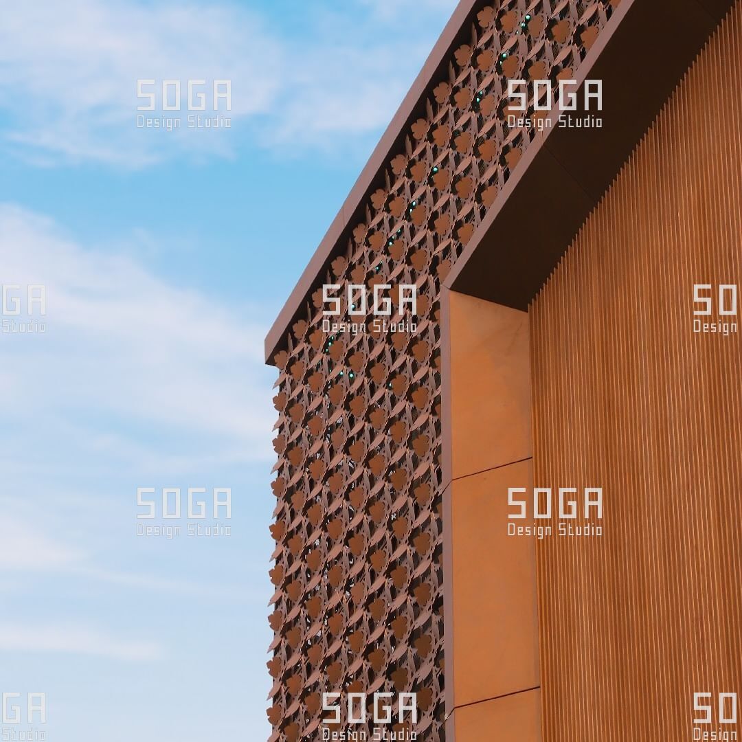 Coin facade disc field meeting flat cladding at a building corner, showing where one production batch ends