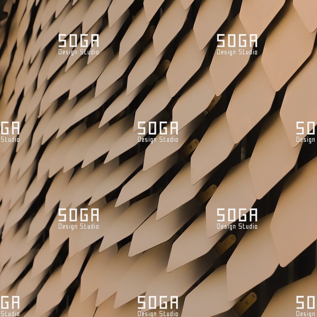 Close-up of sequin facade scales showing head lap, exposure and the shadow line at each overlap