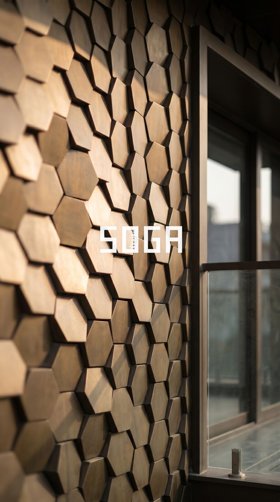 Oblique view of a 3D block facade beside a window reveal, showing joint lines and shadow gaps between modules