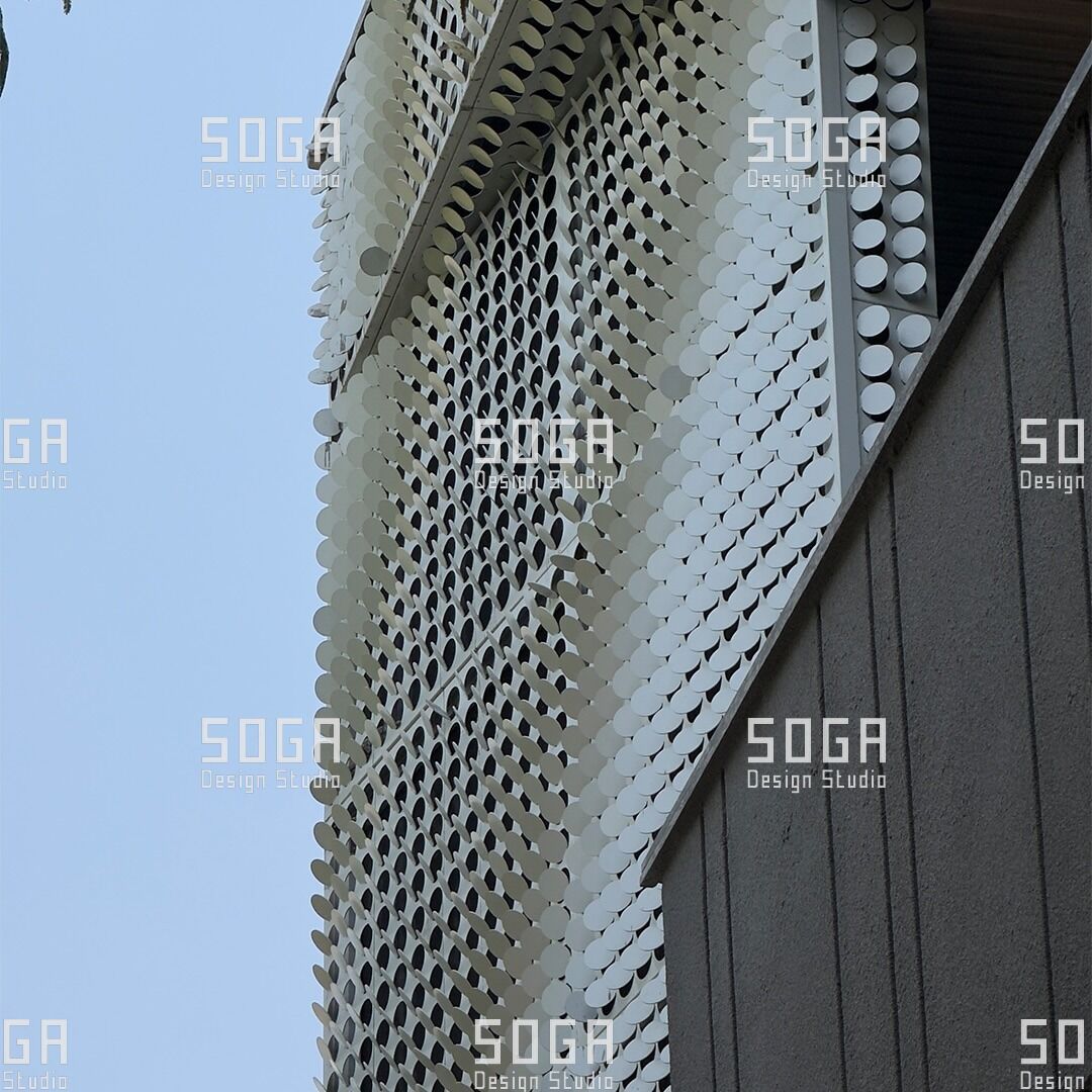 SOGA Coin Facade Installation: Sequencing, Tolerance and Site Realities in India 6 Coin facade field terminating against a wall and stair edge, showing how the boundary condition is resolved