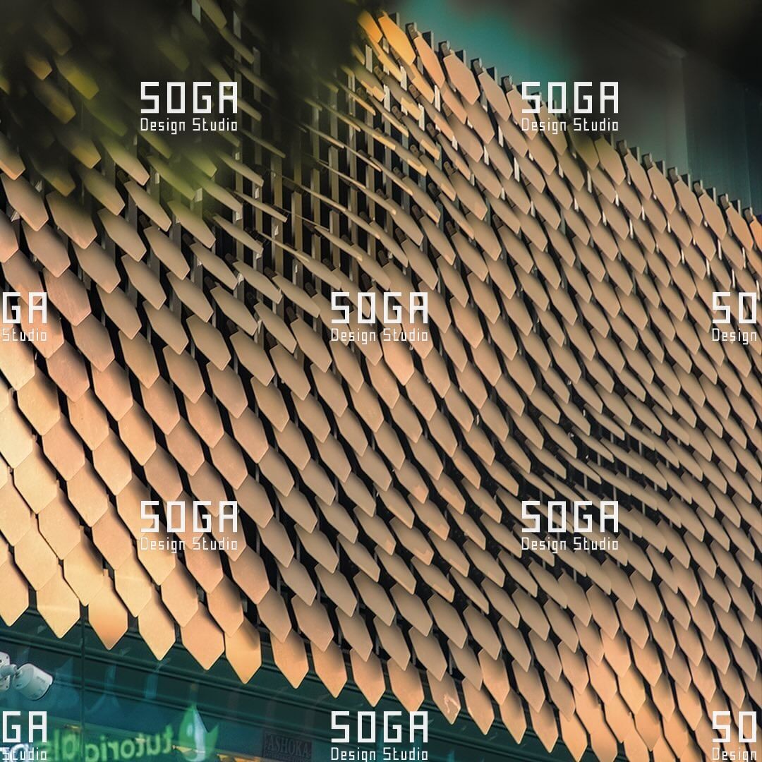 How the SOGA Sequin Facade Is Manufactured: Scale Geometry, Nesting and Material Yield 6 Sequin facade scales seen at an angle, showing the formed lift and edge condition after cutting