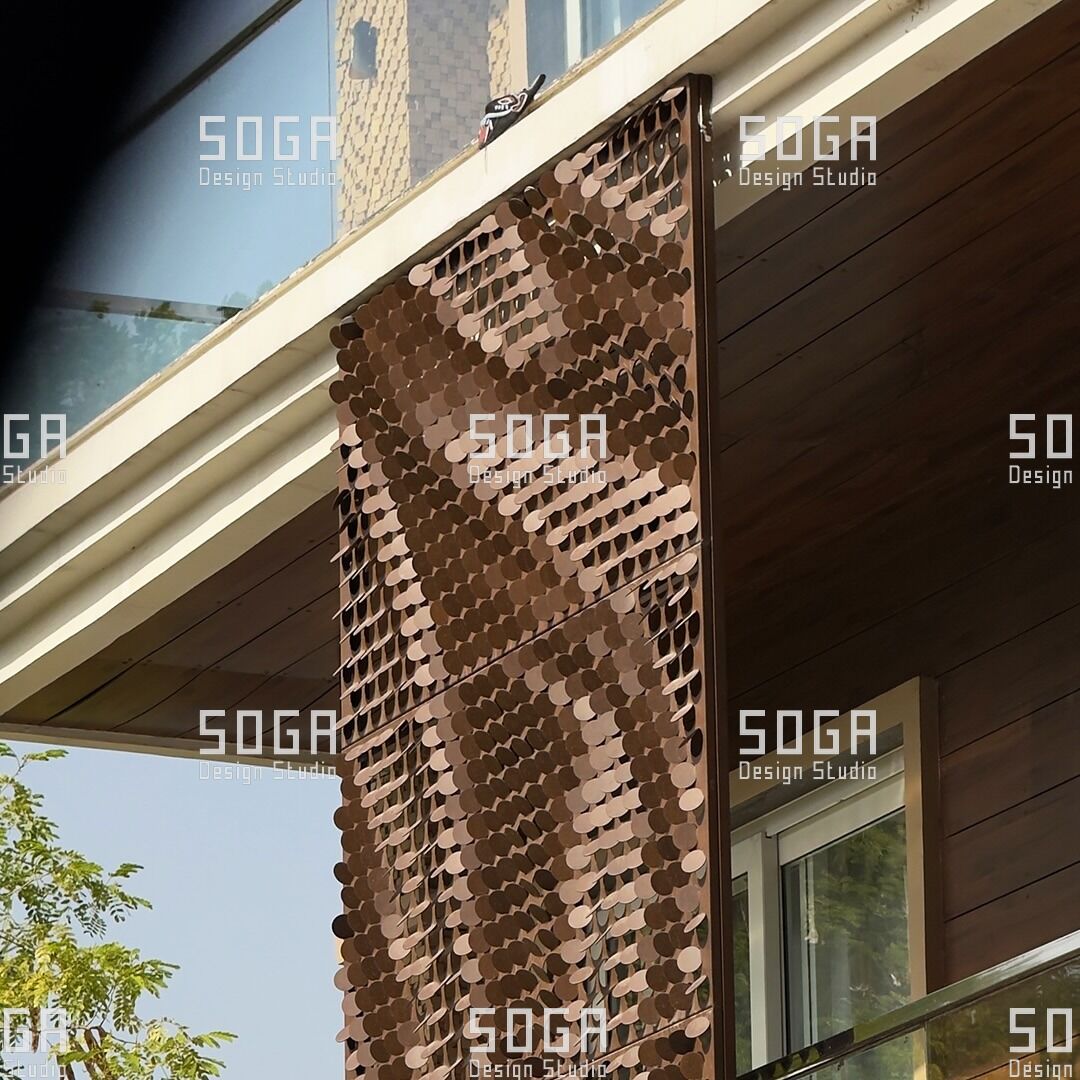SOGA Coin Facade: The Complete Guide to Circular Parametric Metal Panels 6 Coin facade screen meeting a building soffit, showing how the carrier frame transfers load back to the structure