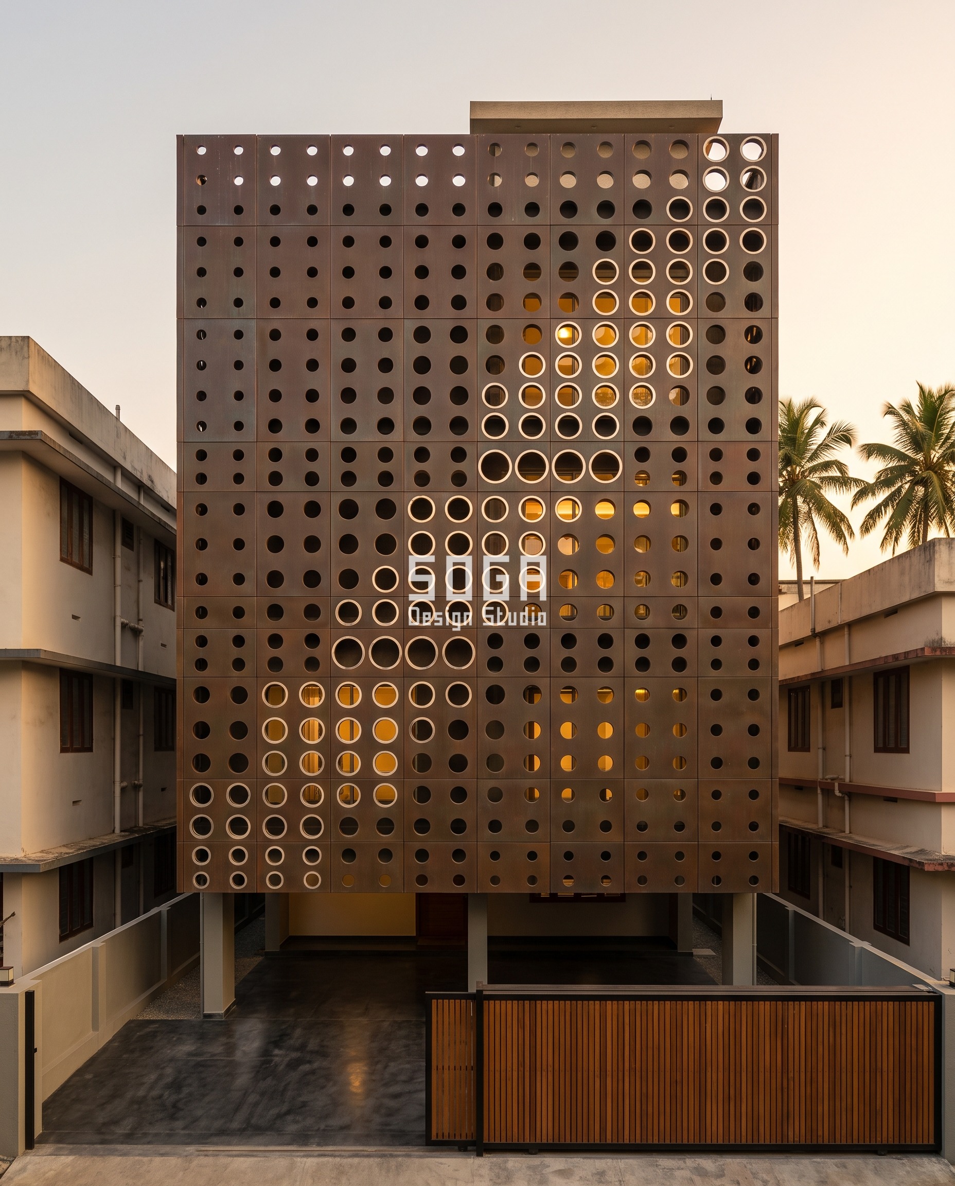 Attractor Point Facade Design: How Parametric Skins Work 8 Attractor curve facade design in Kochi: a solid oxidised copper skin on a fixed 420 mm grid where every hole takes a different diameter, 360 mm along an S-curve and 50 mm at the opposite corners