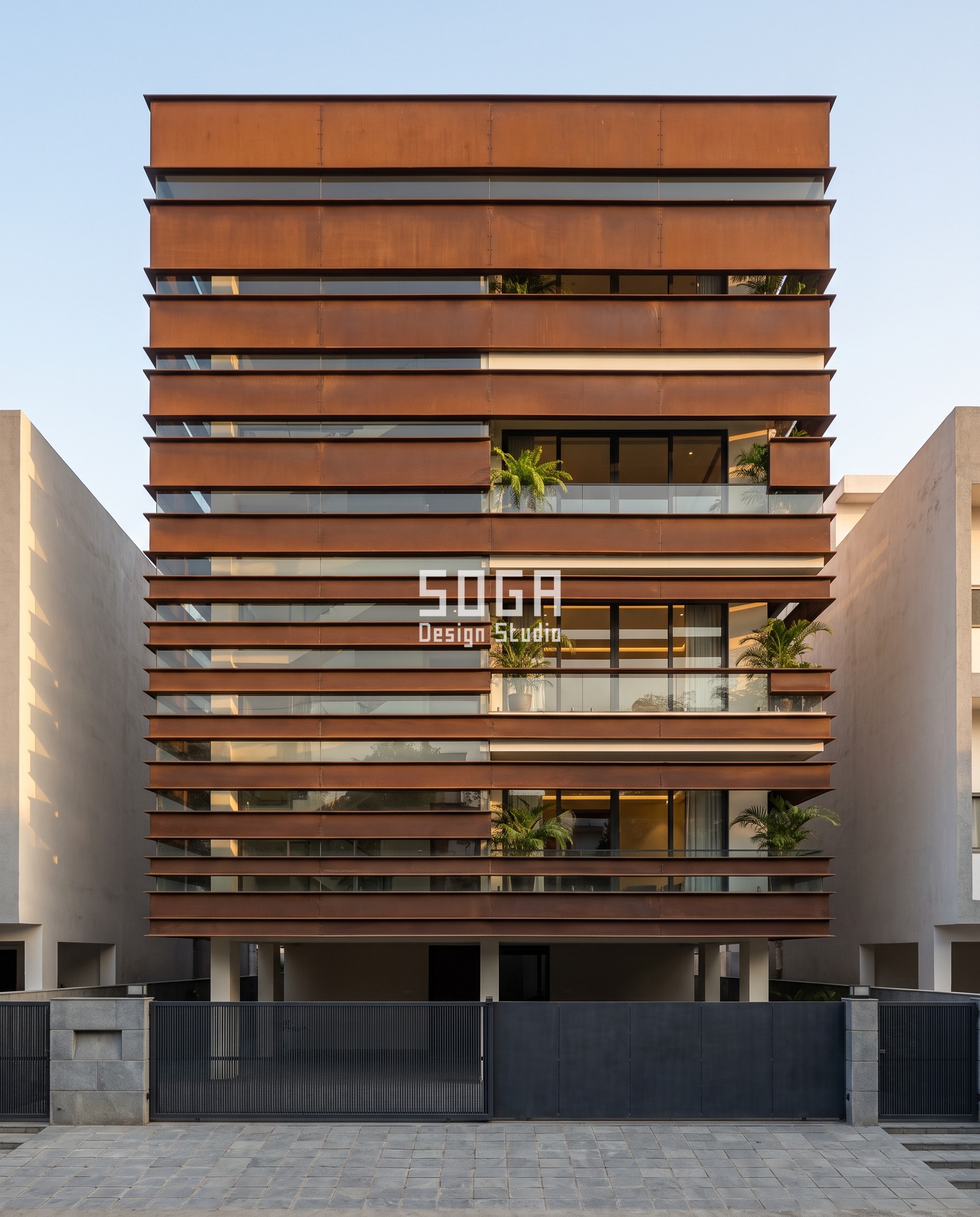 Attractor Point Facade Design: How Parametric Skins Work 4 Corten facade in Lucknow built of horizontal bands whose height falls from 1,100 mm at the parapet to 160 mm above the stilt