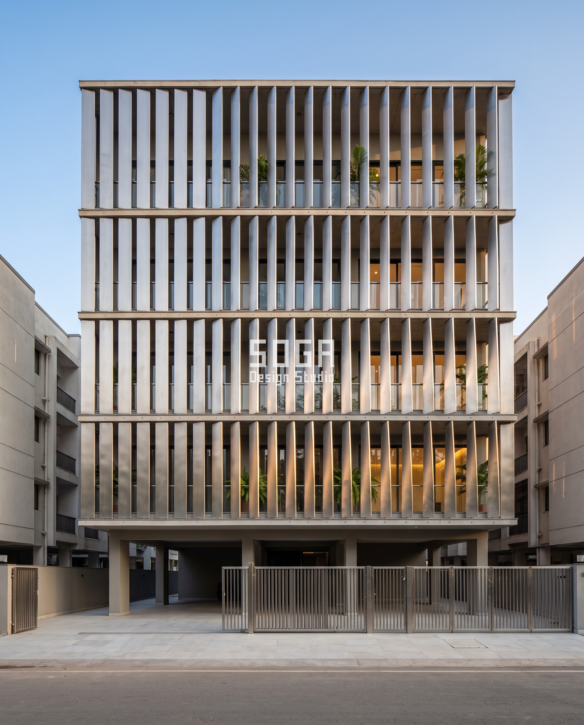 Attractor Point Facade Design: How Parametric Skins Work 5 Stainless steel facade in Vadodara where each vertical blade is twisted along its own height, the amount of twist growing across the frontage