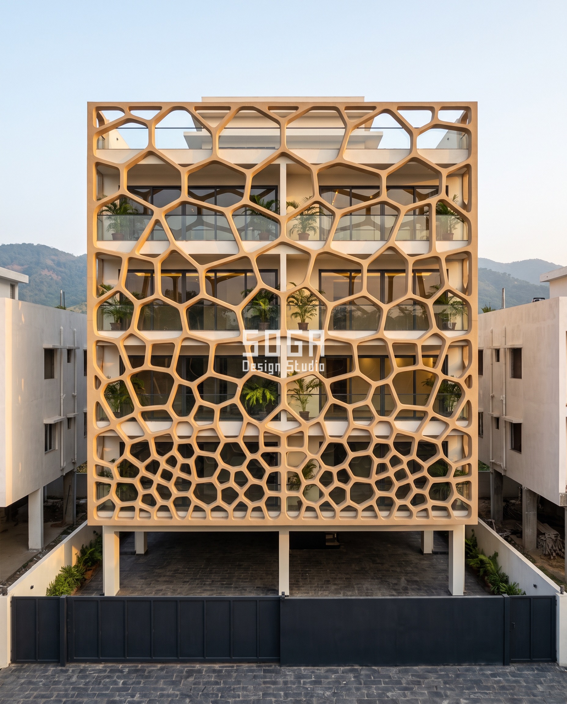 Attractor Point Facade Design: How Parametric Skins Work 6 Deep GRC cell lattice in Guwahati where irregular cells grow from 300 mm at the base to 1,200 mm at the parapet, each a real 200 mm deep open frame