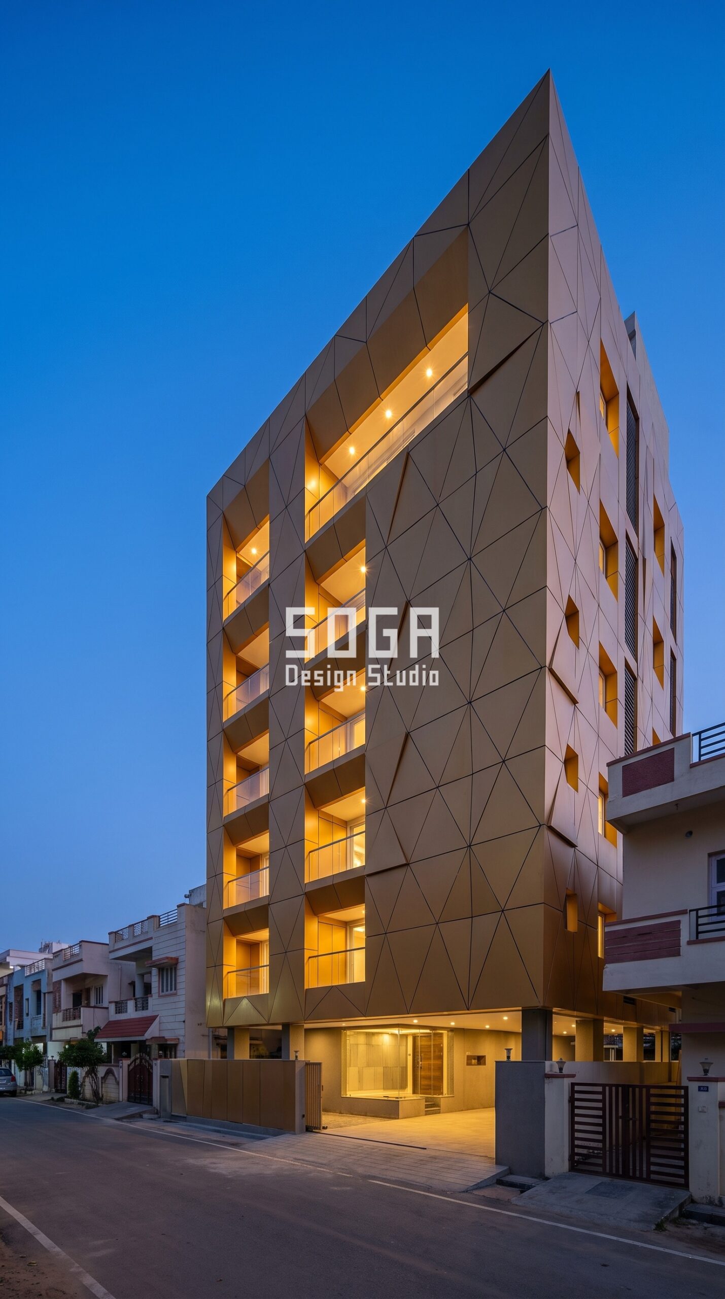 Birds Nesting Behind Elevation Panels India: 20 mm Rule 3 Parametric Shard Grid amber gold facade, Film Nagar, Hyderabad - SOGA Design Studio