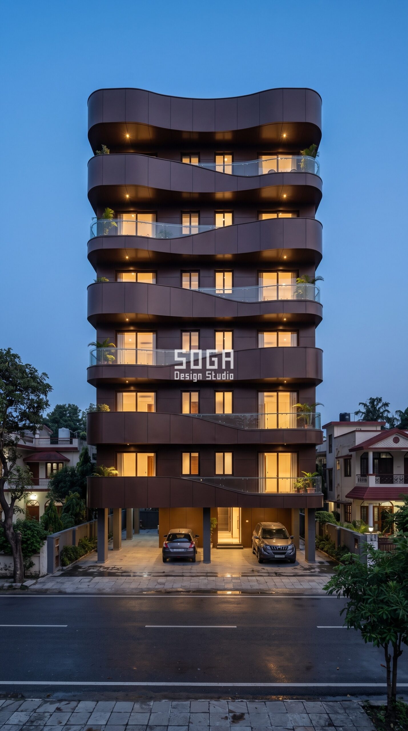 Facade Design Company in India 2026: Elevation Experts 5 Parametric Ribbon Wave bronze balcony facade lit at blue hour in Hyderabad by SOGA Design Studio, facade designer firm India