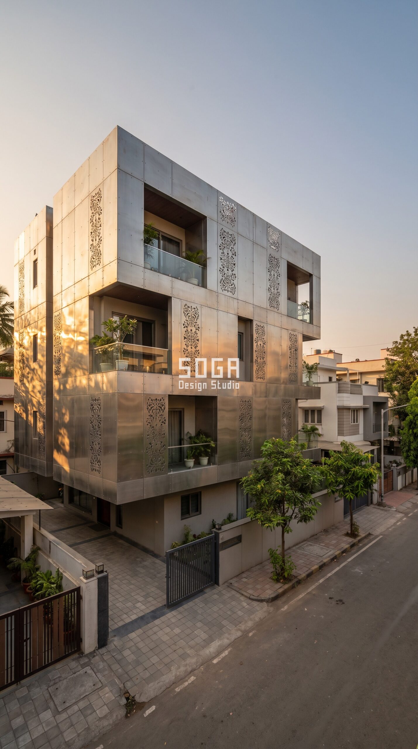 Facade Design Company in India 2026: Elevation Experts 6 Parametric Inlay Panel champagne metal facade with decorative screen inlays in Ahmedabad by SOGA Design Studio