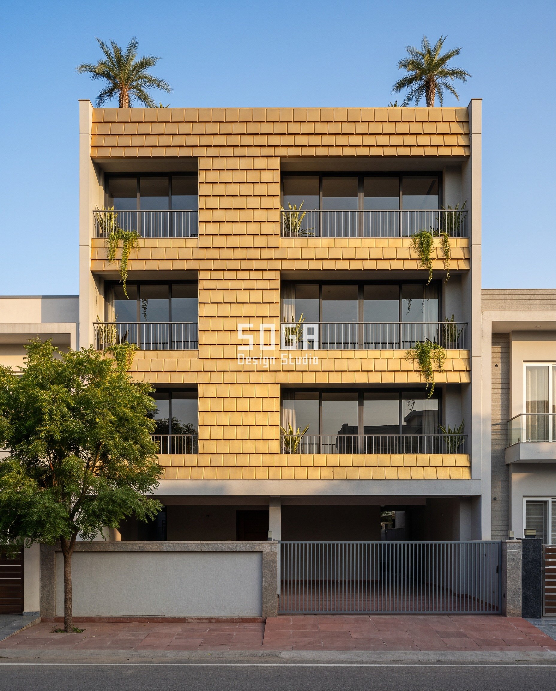 Elevation Panels Making Noise In Wind India: Detune It 2 Golden copper-alloy pressed shingles lapped in strictly level courses across a G+4 residence in Urban Estate, Hisar, in raking side light - a lapped scale rainscreen of the kind detailed so a free edge cannot flutter and make an elevation noisy in wind.