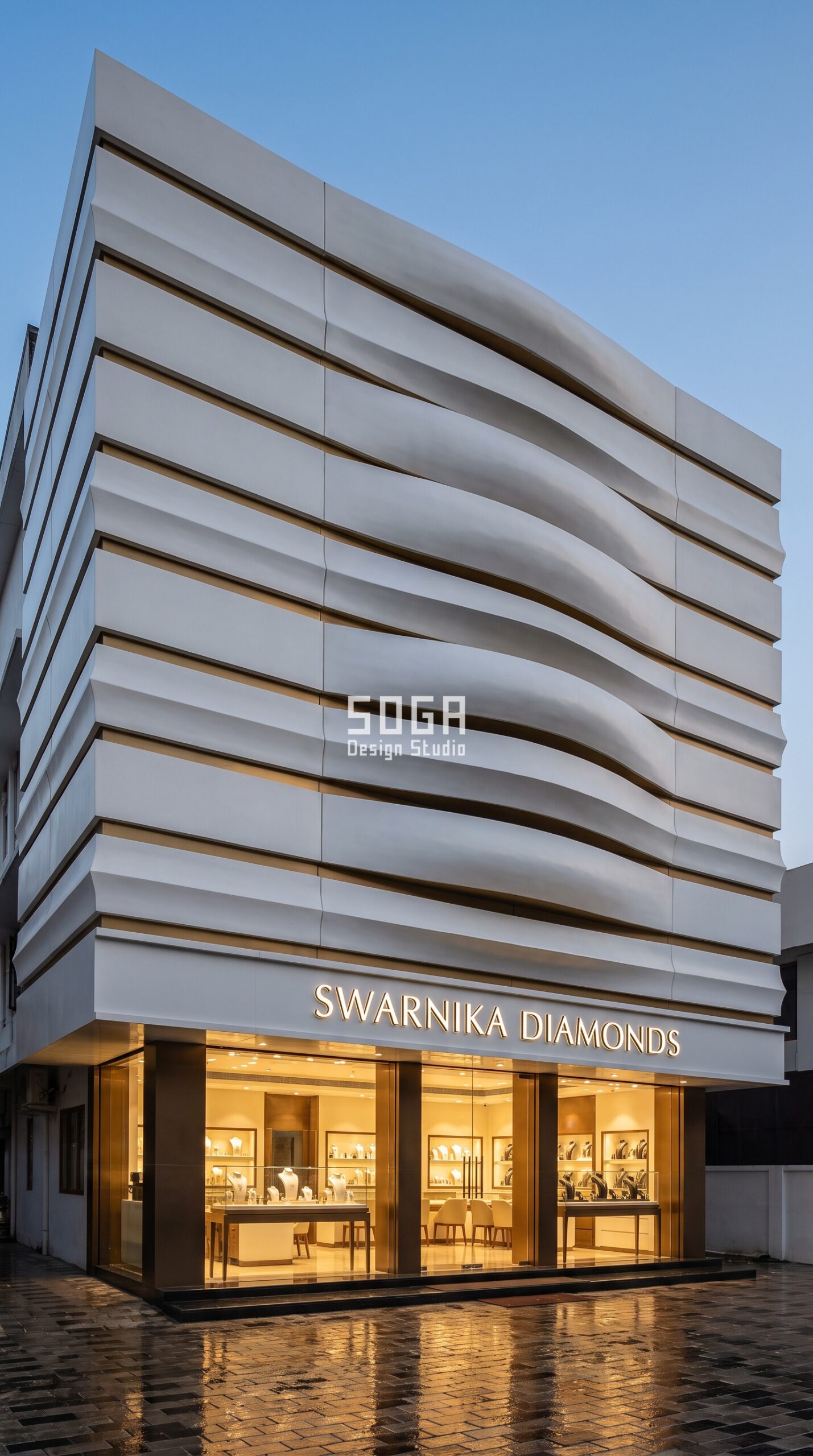 Parametric Wave Band Screen pearl white FRP jewellery showroom facade Kochi - SOGA Design Studio