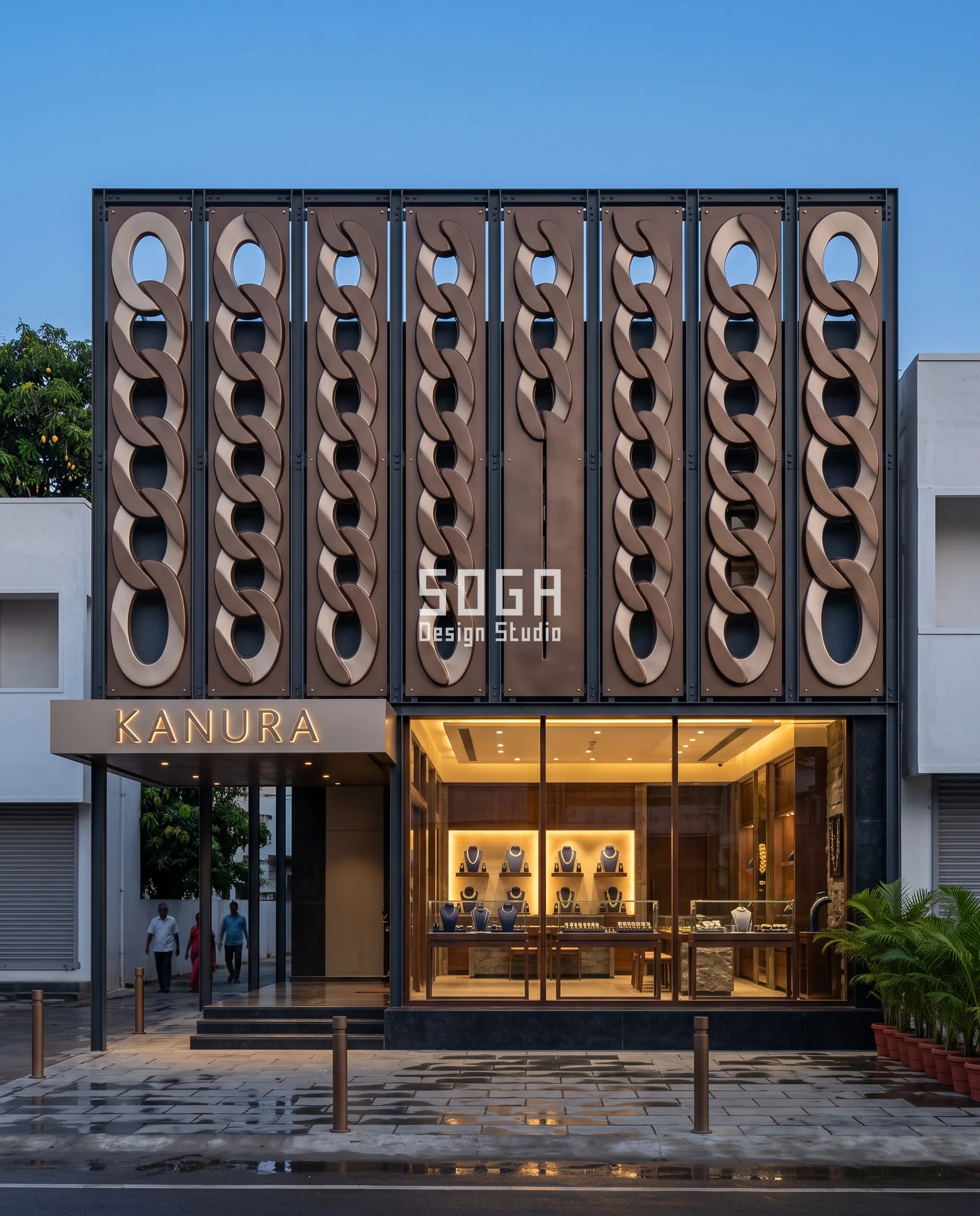 Graduated Perforation Jewellery Showroom Facade India 5 Eight pressed curb-link chains running full height across a Salem silverware showroom at blue hour, the elliptical eye of each link cut clean through the plate and shrinking from wide open at the entrance to a hairline slit over the main display bay - a graduated perforation jewellery showroom facade in India