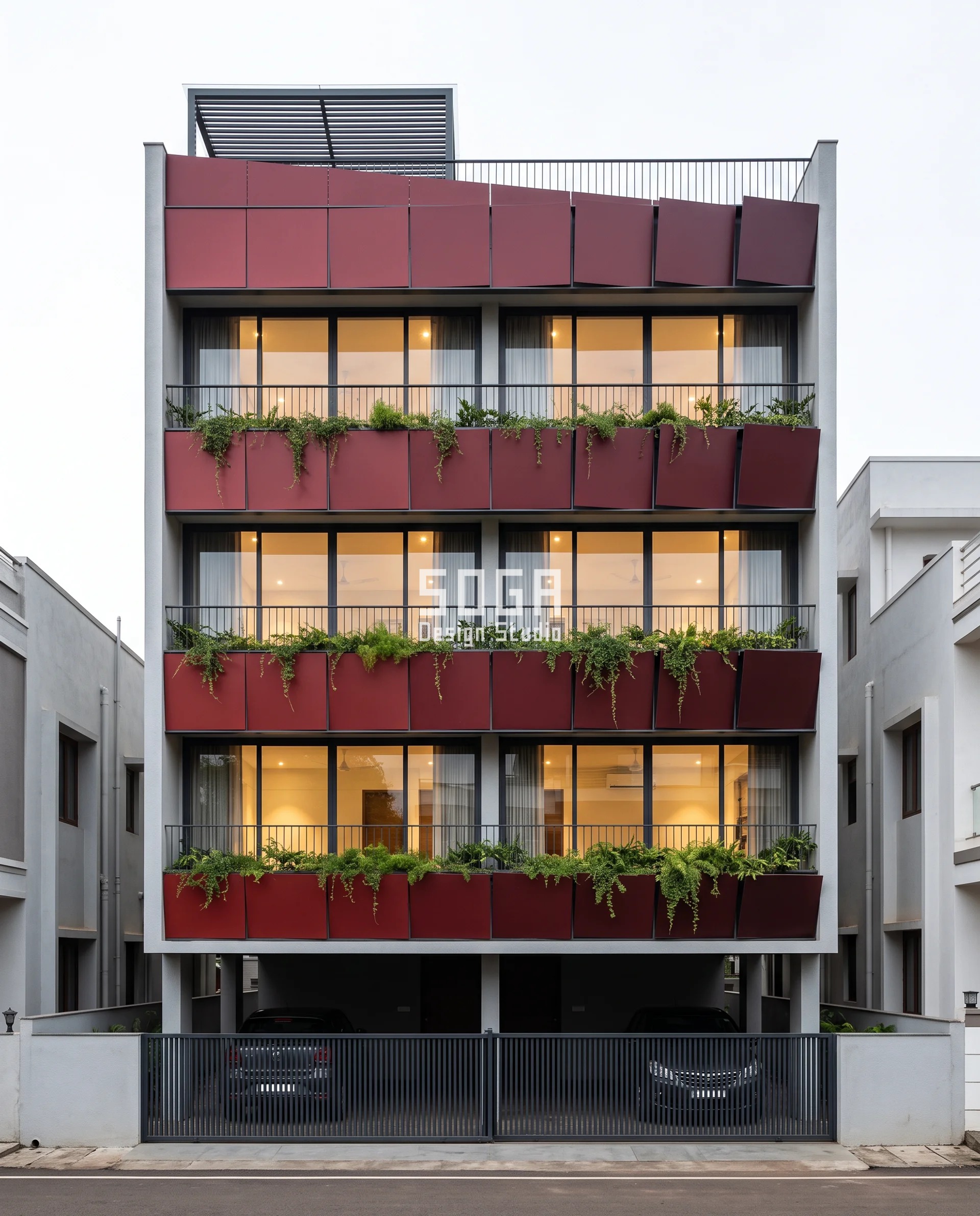 Reduce Road Noise House Facade India: Depth, Not Gaps 2 Oxblood-maroon aluminium plates along the balcony bands of a Belagavi house, each one hinged on its own bottom edge and leaning further out across the band so a widening slot of shadow opens above every plate - a tilted-reflector approach to reduce road noise on a house facade in India.