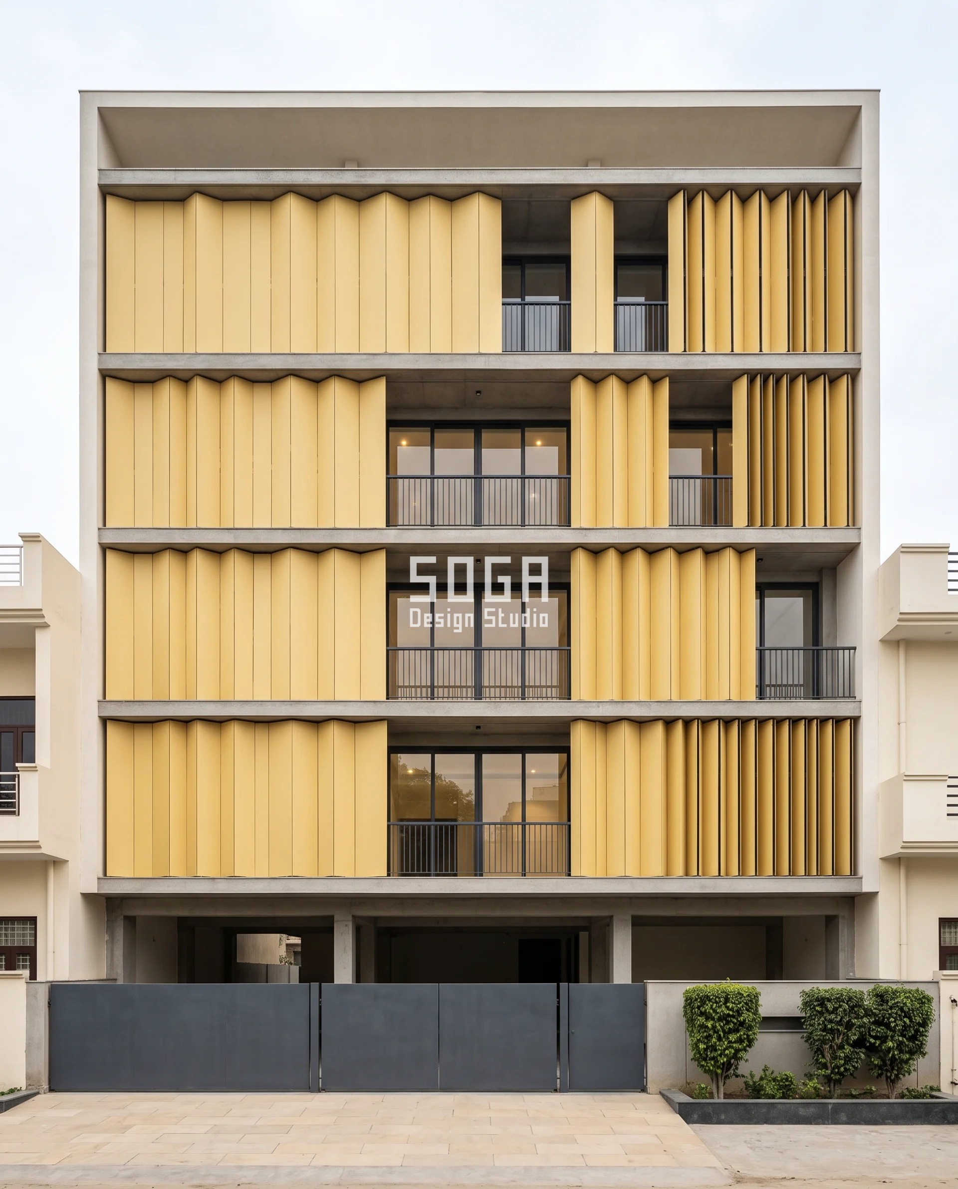 Straw-yellow compact HPL pleats running across a wide Panipat frontage under flat overcast light, the folds a barely creased sheet at the left bay and a half-metre-deep accordion at the right, spreading facade projection in front setback India allowances sideways across the elevation.