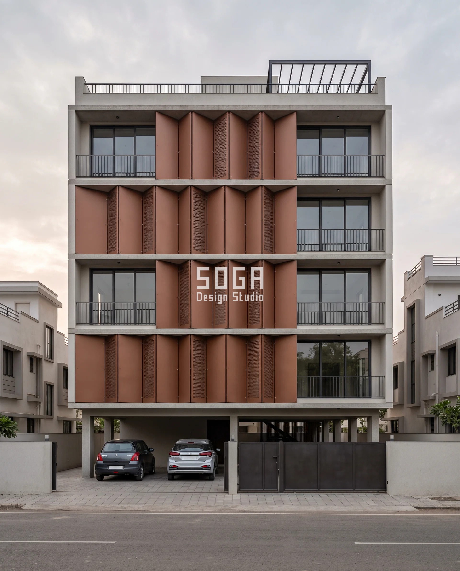 Stop Rain Water Entering Balcony India With 692 mm Reach 2 Cinnamon-brown folded aluminium plates on a Vadodara corner plot, each 420 mm deep fold pocket throwing hard shadow, the handing sequence ganged at the exposed corner for balcony rain protection against the south-west squall.