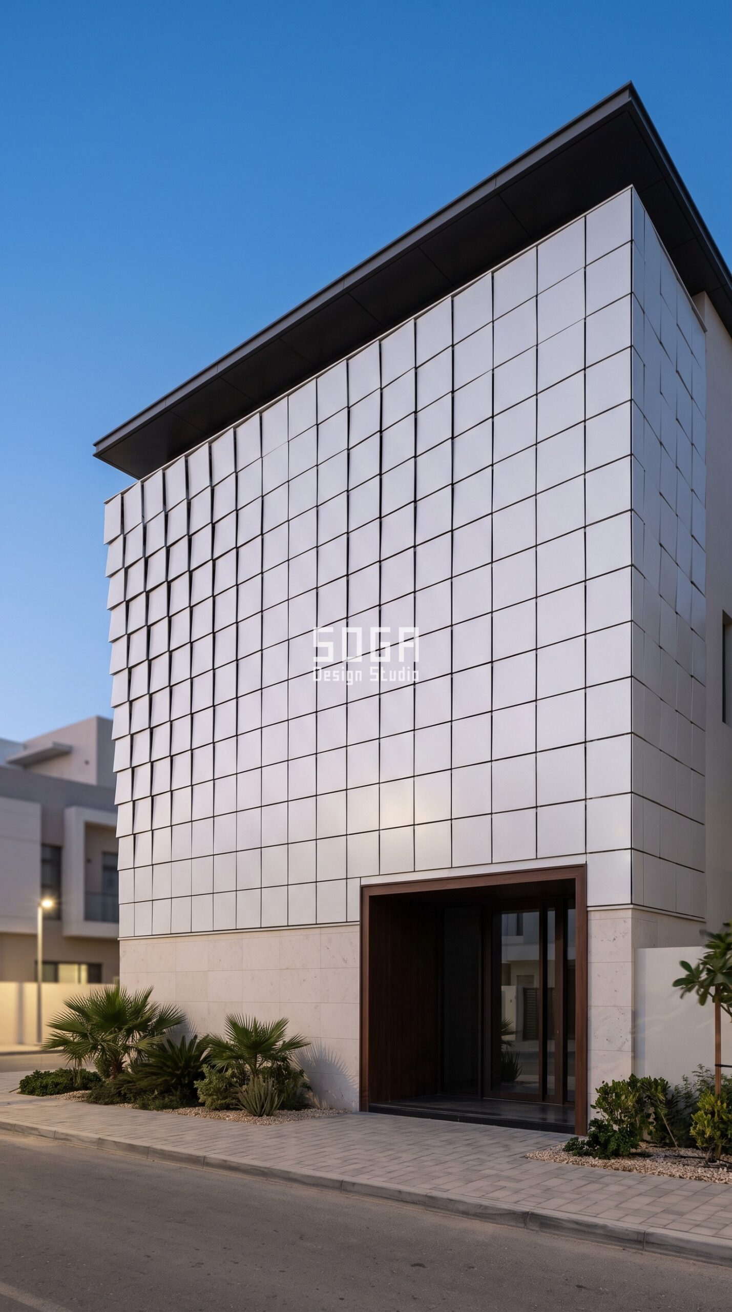 Parametric Reflect Scale pearl white PVDF-coated aluminium residential facade Sharjah - SOGA Design Studio