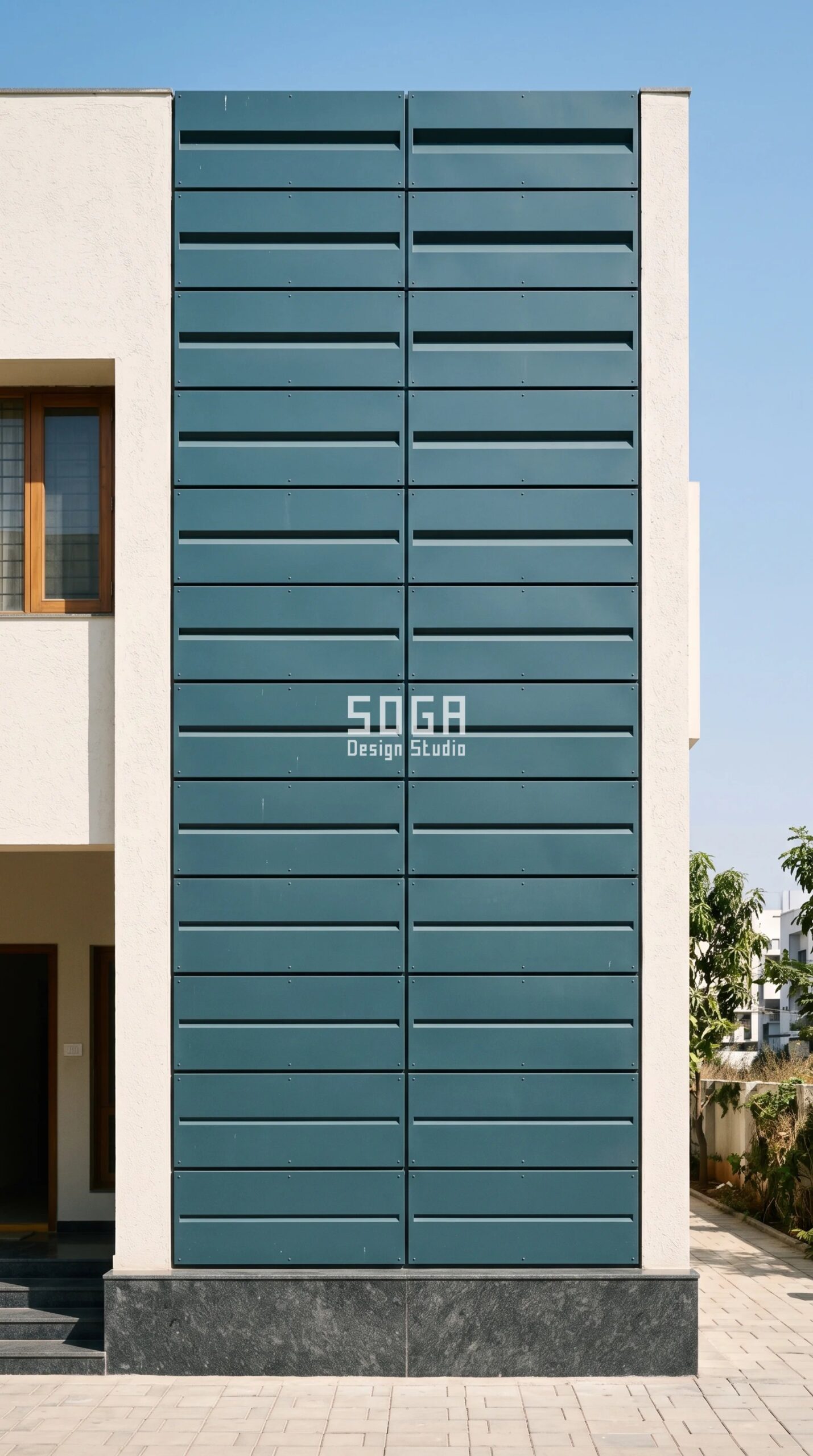 Villa facade warranty detail - Parametric Vee-Rise Cassette Course ink-teal powder-coated cassette rainscreen on a G+2 Hyderabad independent villa by SOGA Design Studio