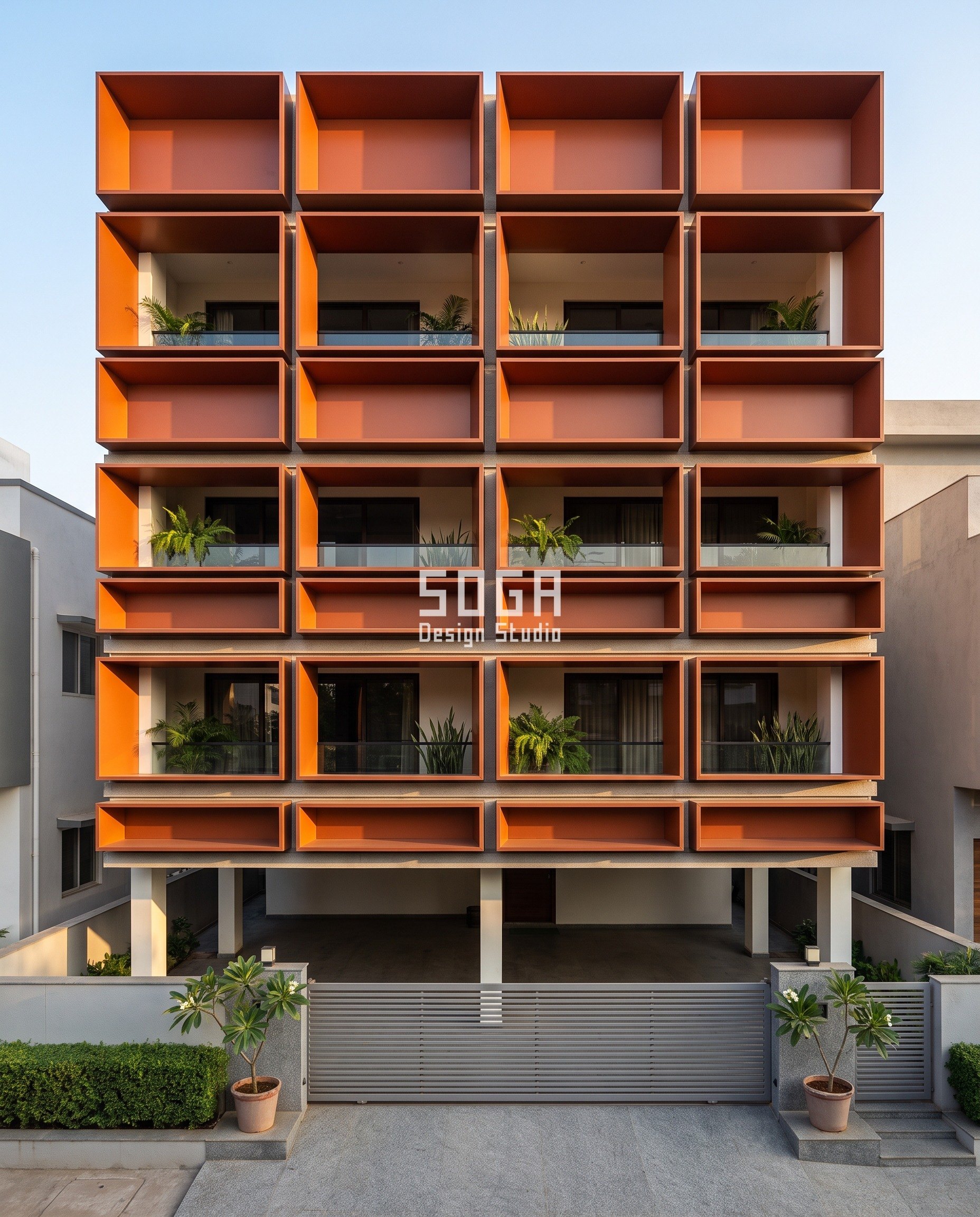 Elevation Panels Making Noise In Wind India: Detune It 1 Burnt-sienna PVDF folded aluminium cassettes on a G+3 residence in Nehru Nagar, Bhilai, every panel a deep open tray with four visible side walls holding its own shadow - the folded section that stops elevation panels making noise in wind by stiffening a flat sheet.