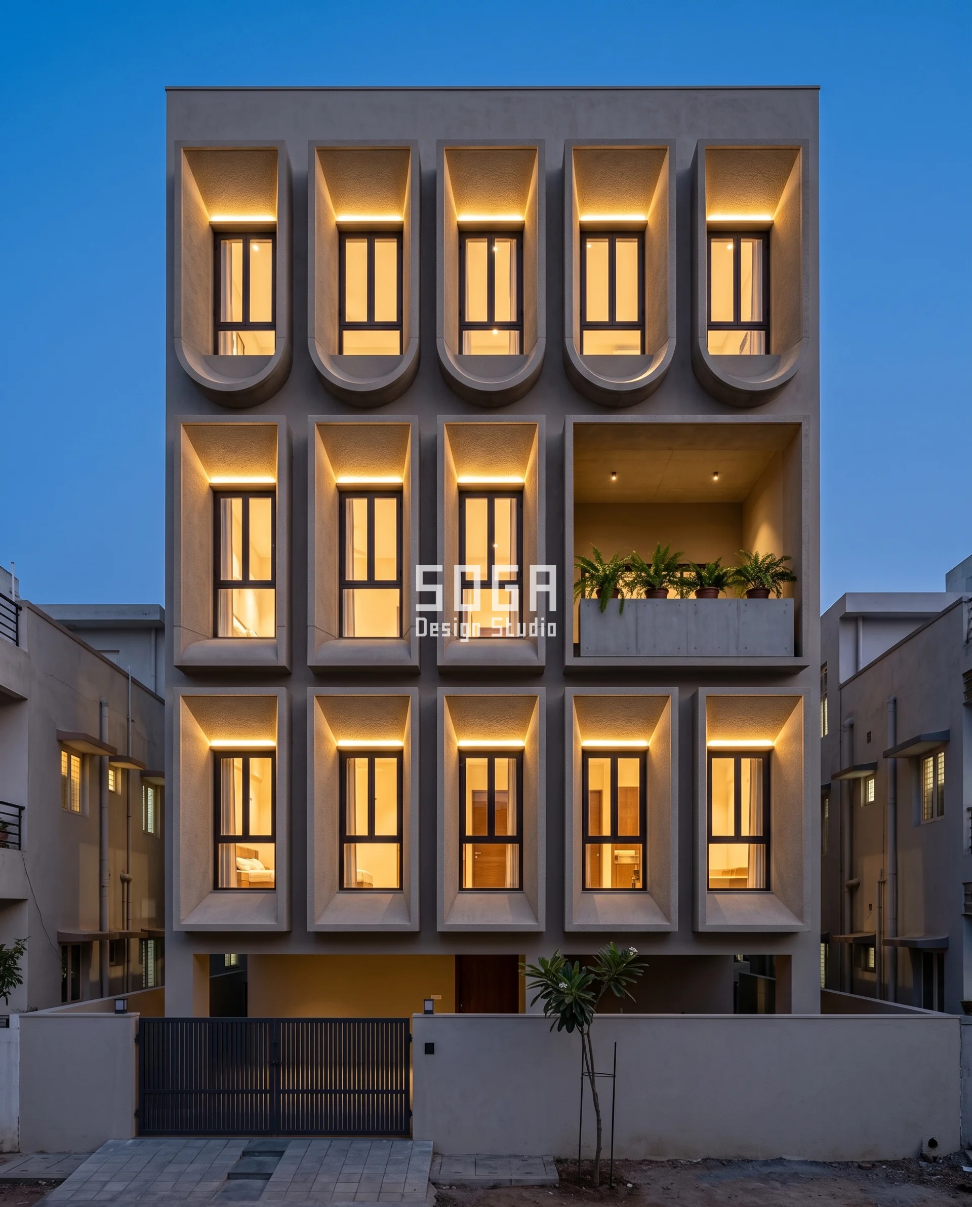 Blue-hour view of a Vijayawada residence where 450 mm splayed precast reveals glow from concealed coves and the cast sills swell floor by floor into a half-round, the profile that makes a pigeon proof balcony without net.