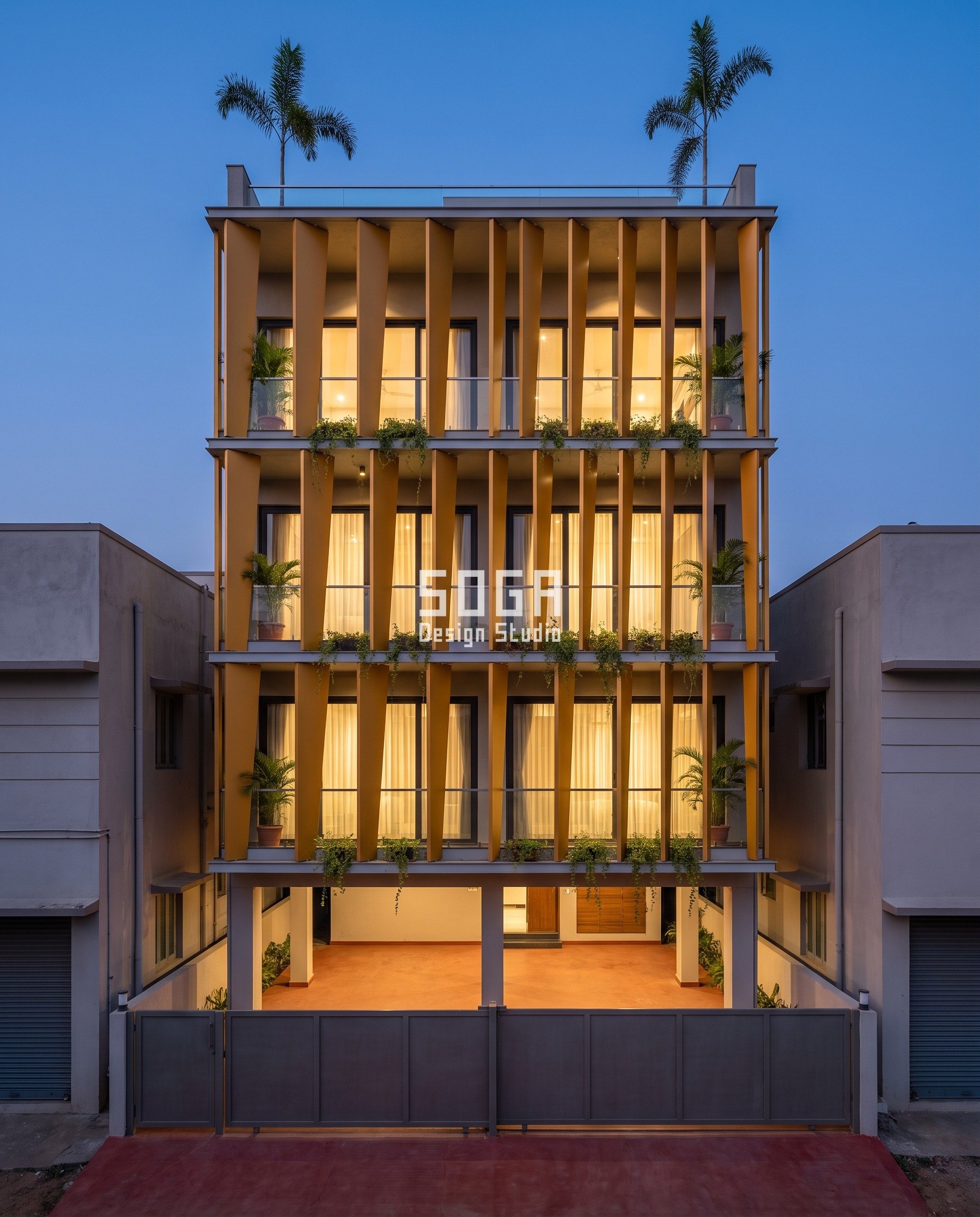 Black Streaks On House Elevation: Litres Per Metre Of Edge 2 Mango-gold PVDF aluminium funnel fins on a G+3 residence in Gosaninuagaon, Brahmapur at dusk, each fin tapering from a 400 mm head to a narrow foot so the whole face discharges at one point instead of streaking the slab edge.