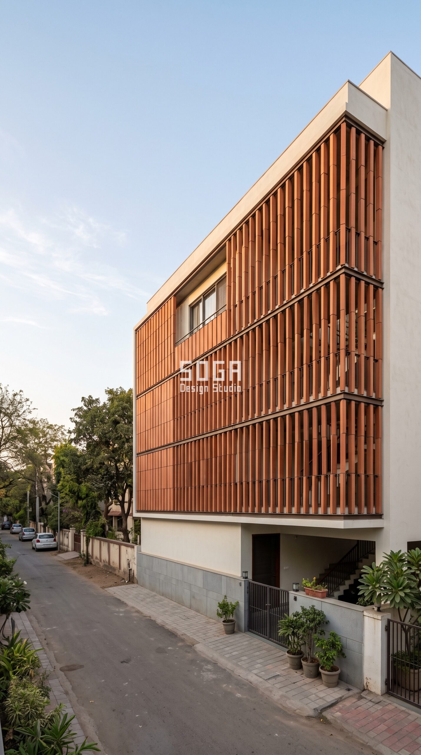 Parametric Ember Baguette terracotta rainscreen residential facade Ahmedabad - SOGA Design Studio