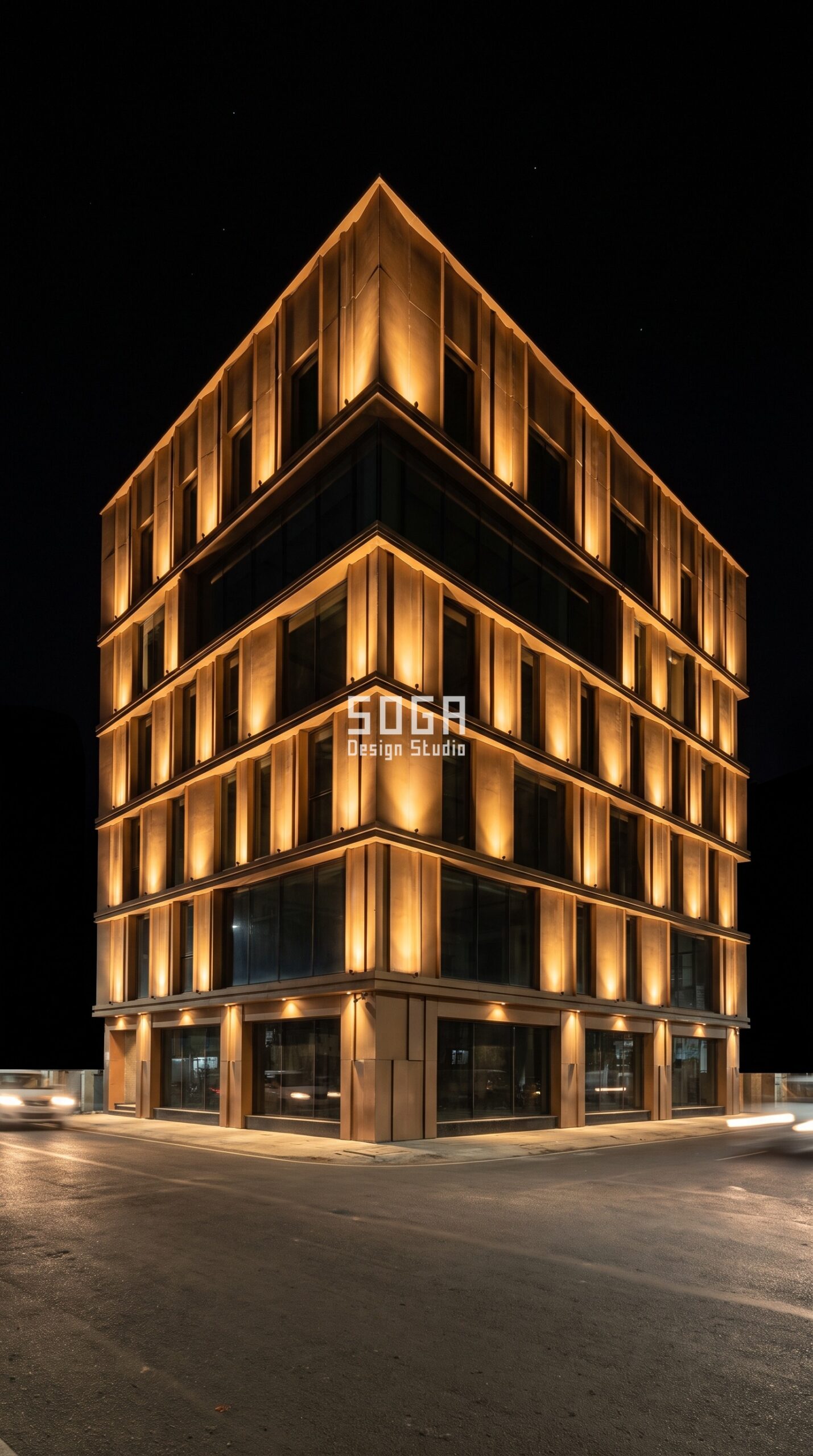 Why Facade Design Matters for Commercial Buildings 2026 5 Commercial building facade at night with warm grazing uplight revealing bronze relief depth, Chennai India - SOGA Design Studio