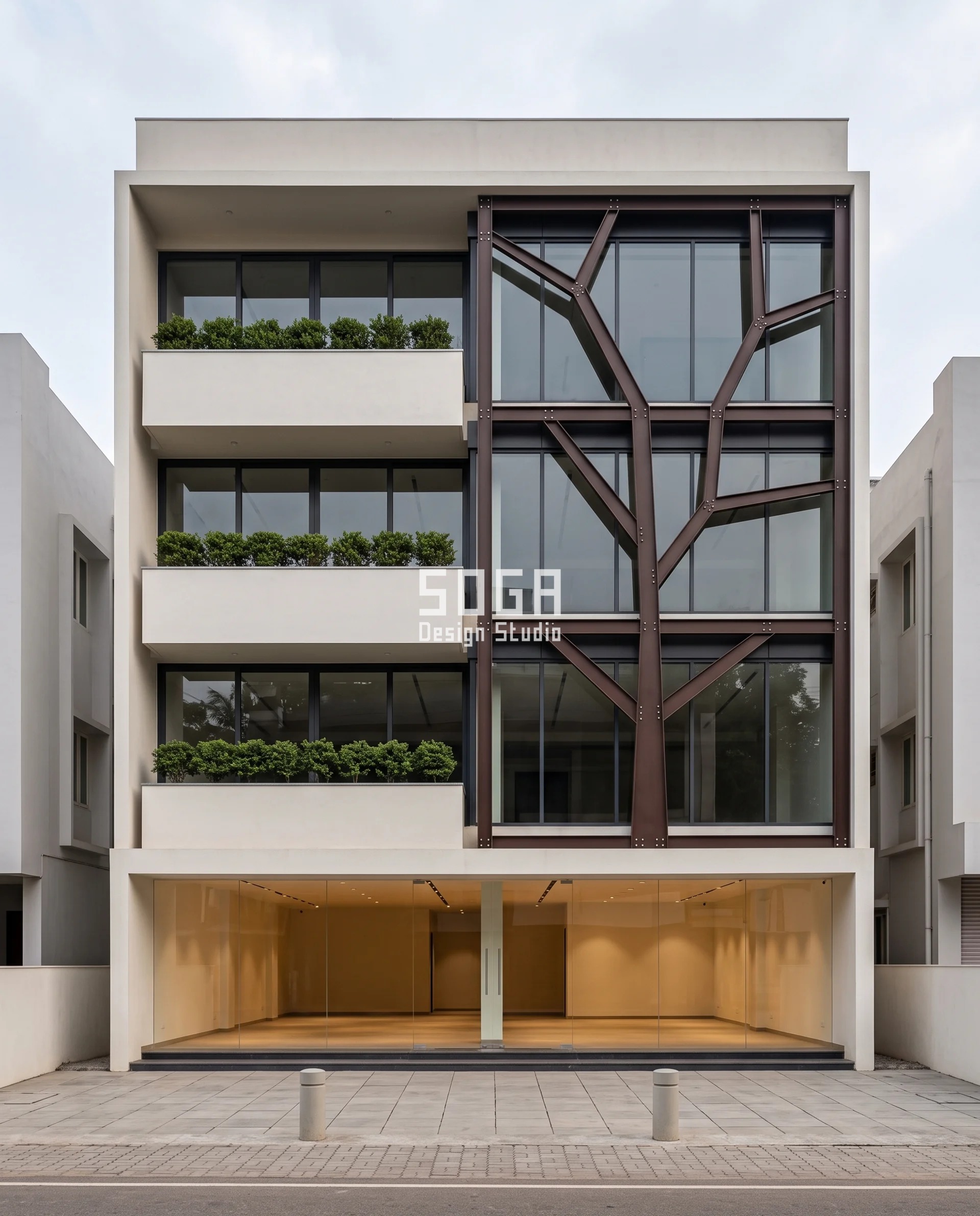 Facade Panel Wind Load India: Why Smaller Is Not Safer 4 Cocoa-brown duplex-finished steel branch frame standing clear of the glazing on a G+3 Mangaluru showroom, each plate member tapering along its run to carry facade panel wind load in open coastal terrain.