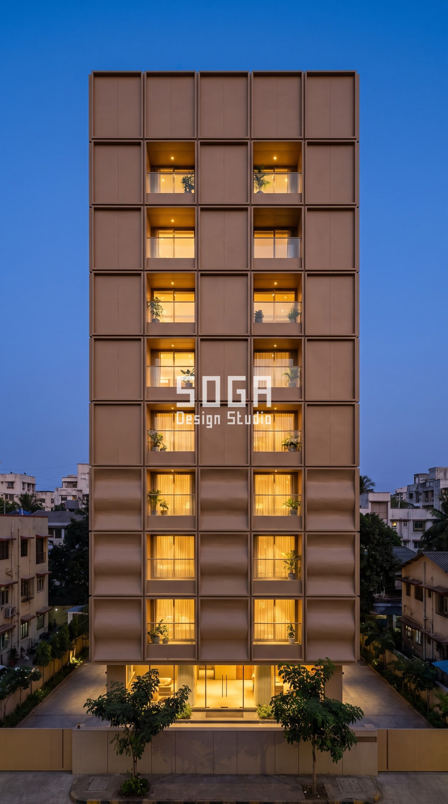 Window grill alternative in Mumbai - Parametric Bow Relief screen standing clear of the wall in matte warm desert sand powder-coated steel