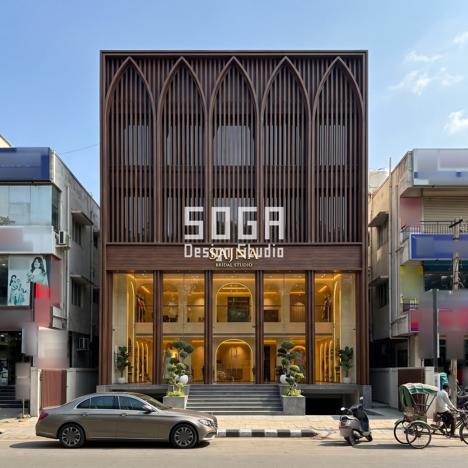Arched shopfront facade India: five pointed arches of vertical dark-timber-tone fins over a double-height glass showroom