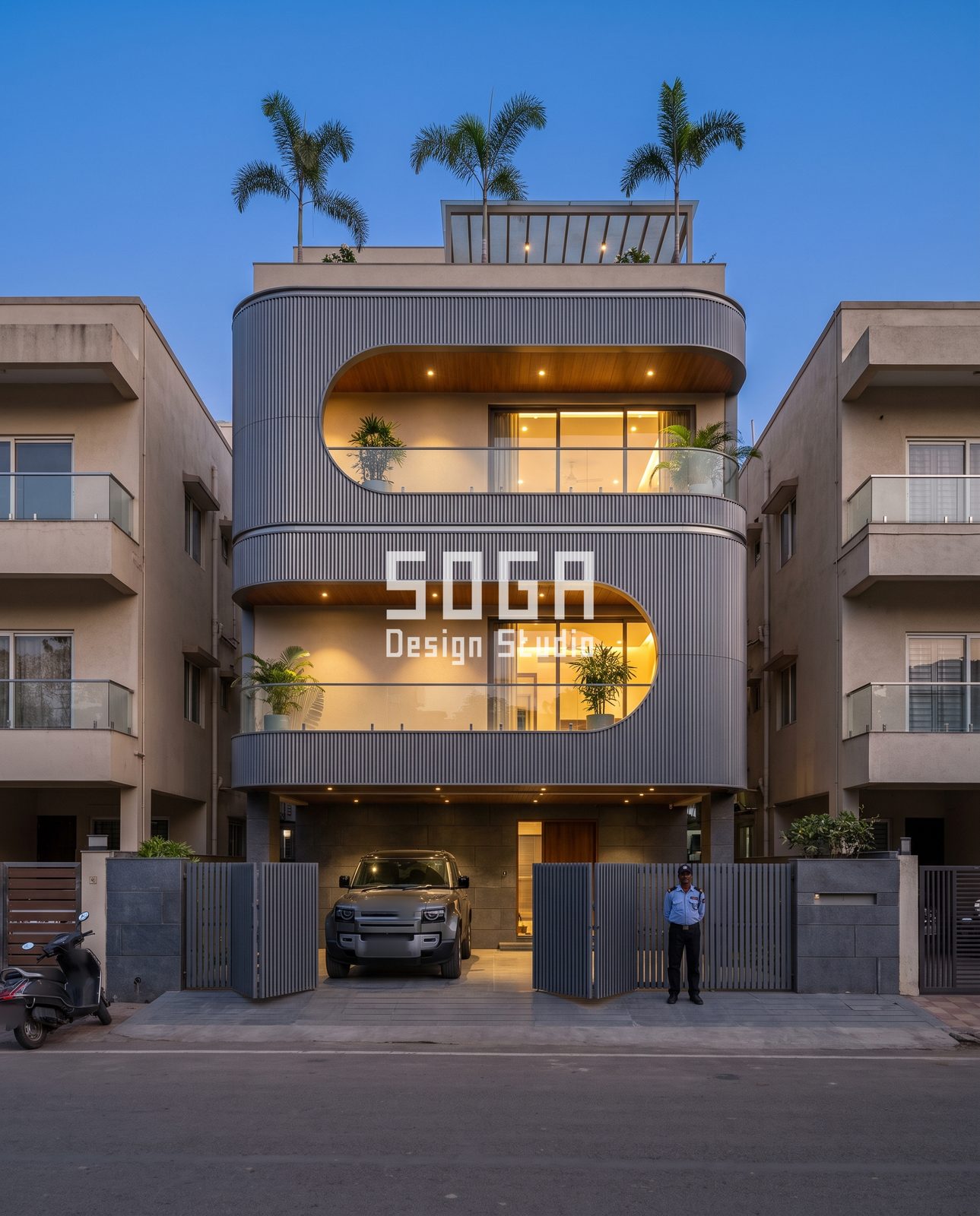 Boxes, Wings, Flutes, Blades and Arches: 5 Compact House Facade Ideas for India 3 Rounded silver-grey fluted G+2 house with D-shaped balcony openings at blue hour, facade concept India