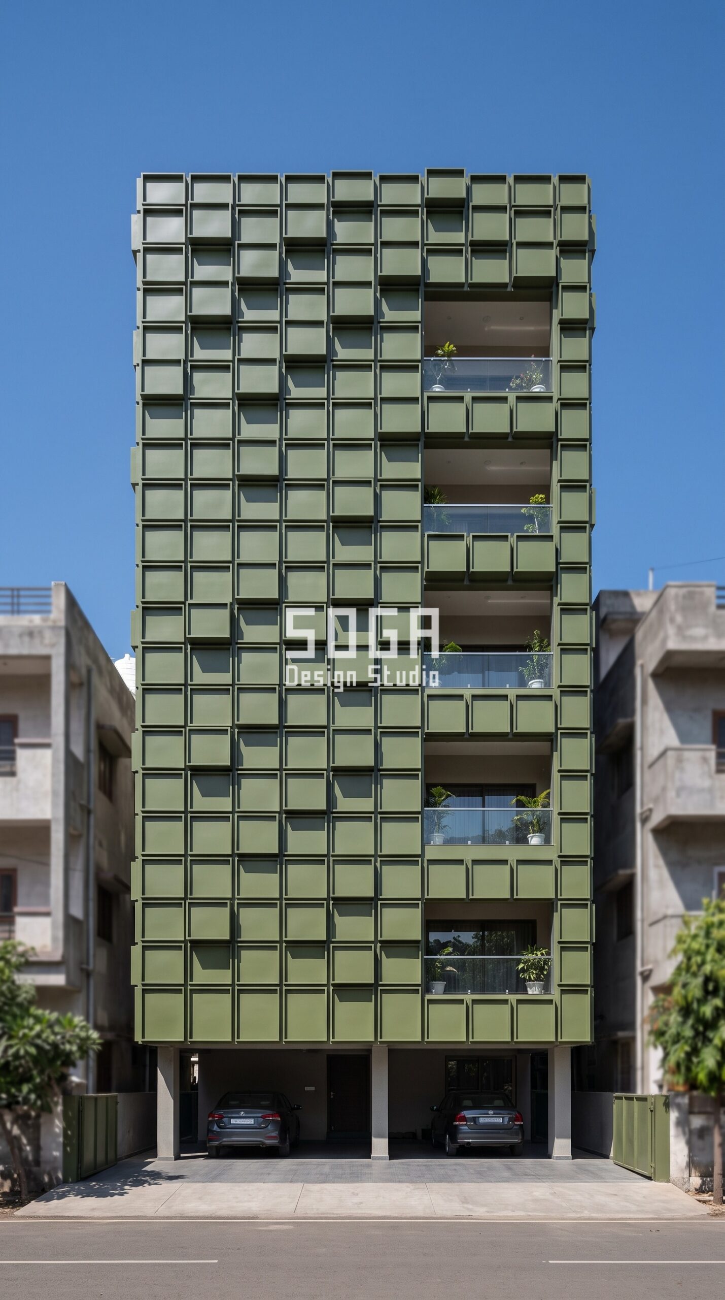 Does a Facade Screen Block the View From Inside? India 1 Parametric Dentil Grid ral 6003 military olive green facade, Vijay Nagar, Indore - SOGA Design Studio