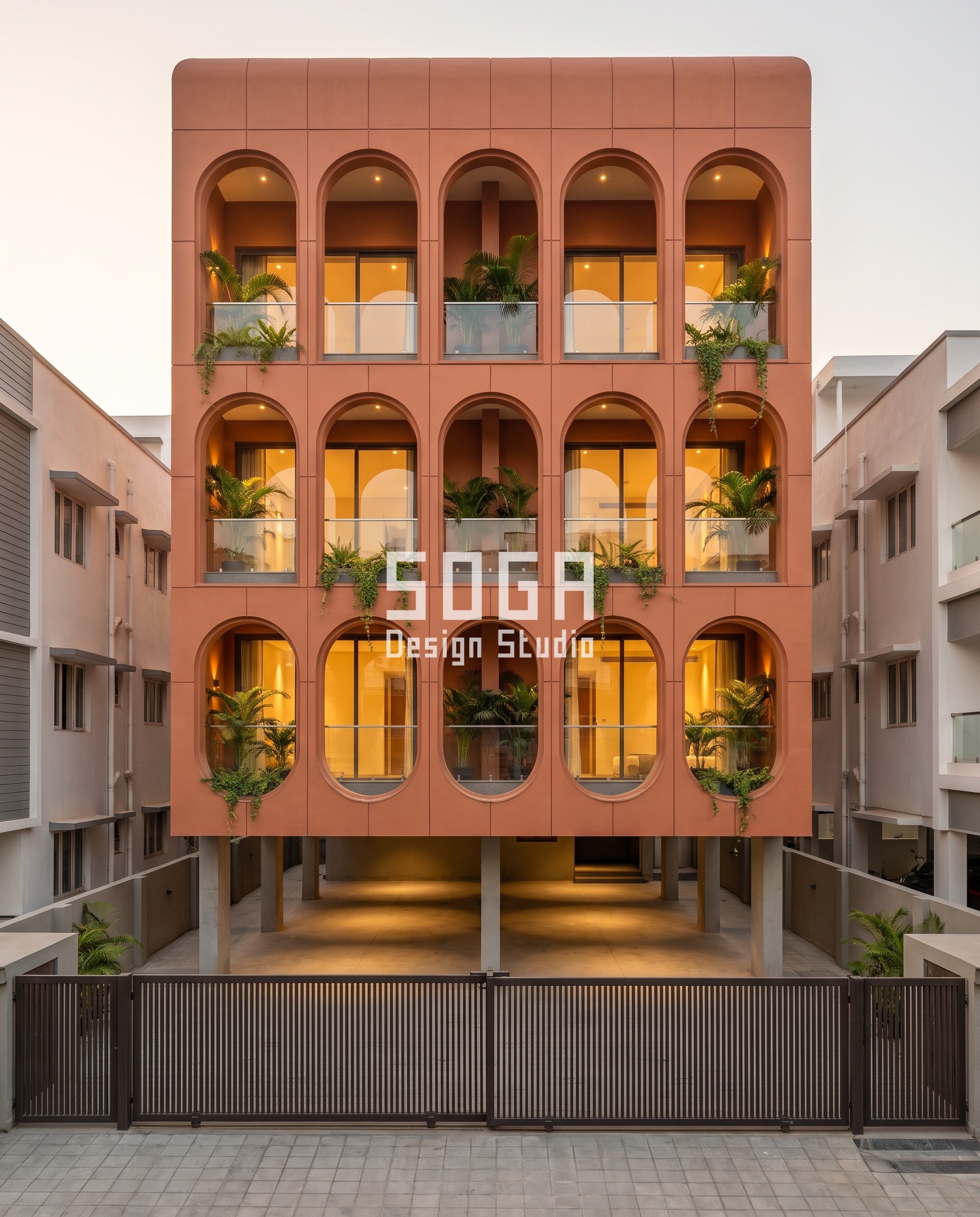 North Facing House Elevation Design India: 8 Hours of Sun 2 Parametric Arch Carve terracotta-toned extruded clay facade, Saidapet, Chennai - SOGA Design Studio