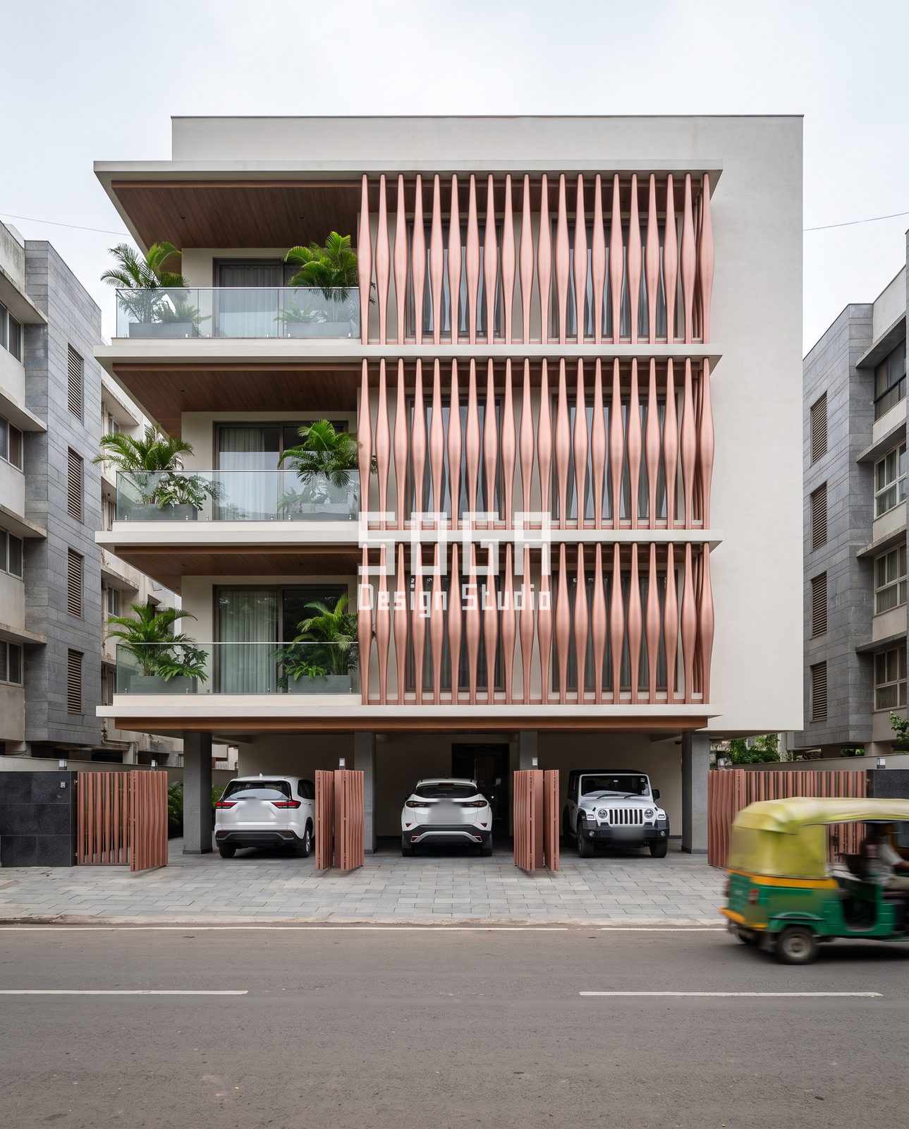 Angular, Triangulated, Finned, Draped and Looped: 5 Balcony Facade Ideas for India 3 Copper-pink tapered vertical fin screen over glass balconies on a house in India