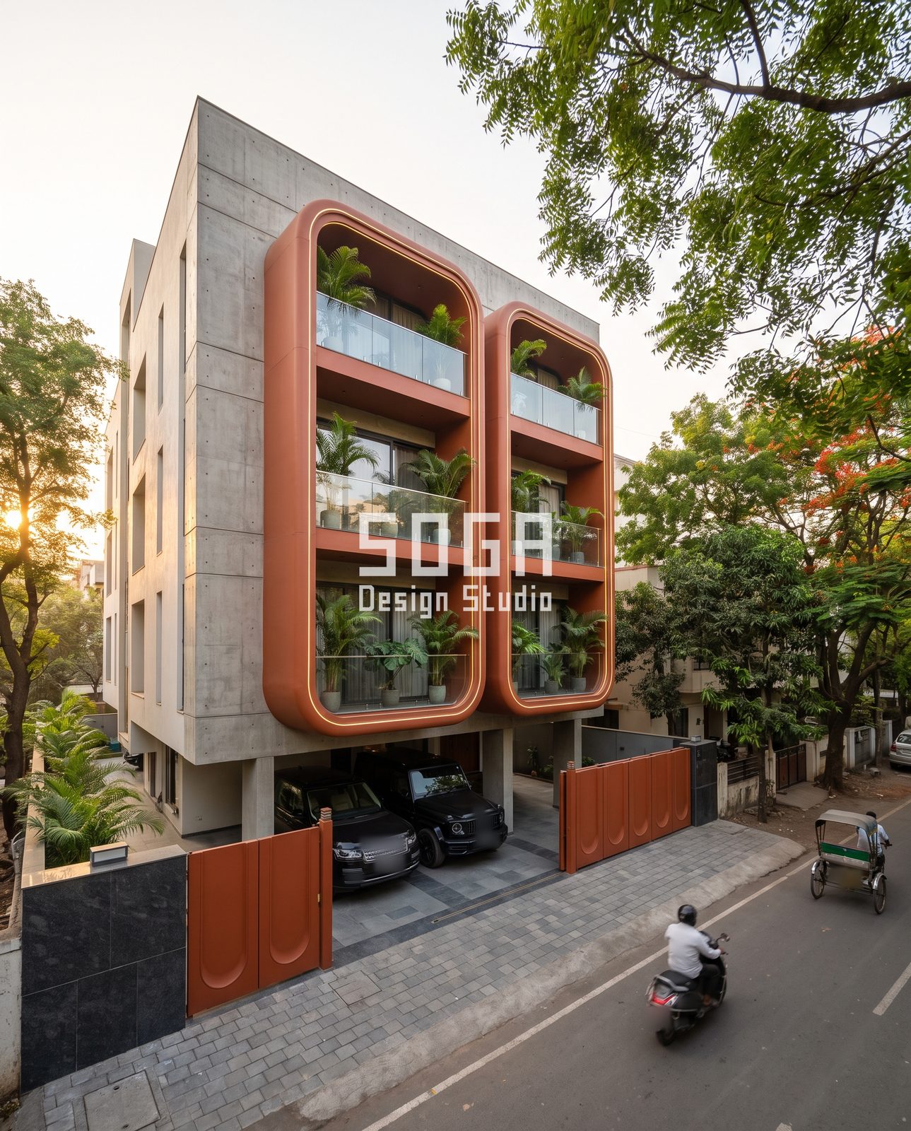 Spine, Capsule, Lancet, Ribbon and Frame: 5 Cantilever Balcony Facade Ideas for India 5 Two rust-red rounded picture-frame balcony boxes on a board-marked concrete apartment building, India