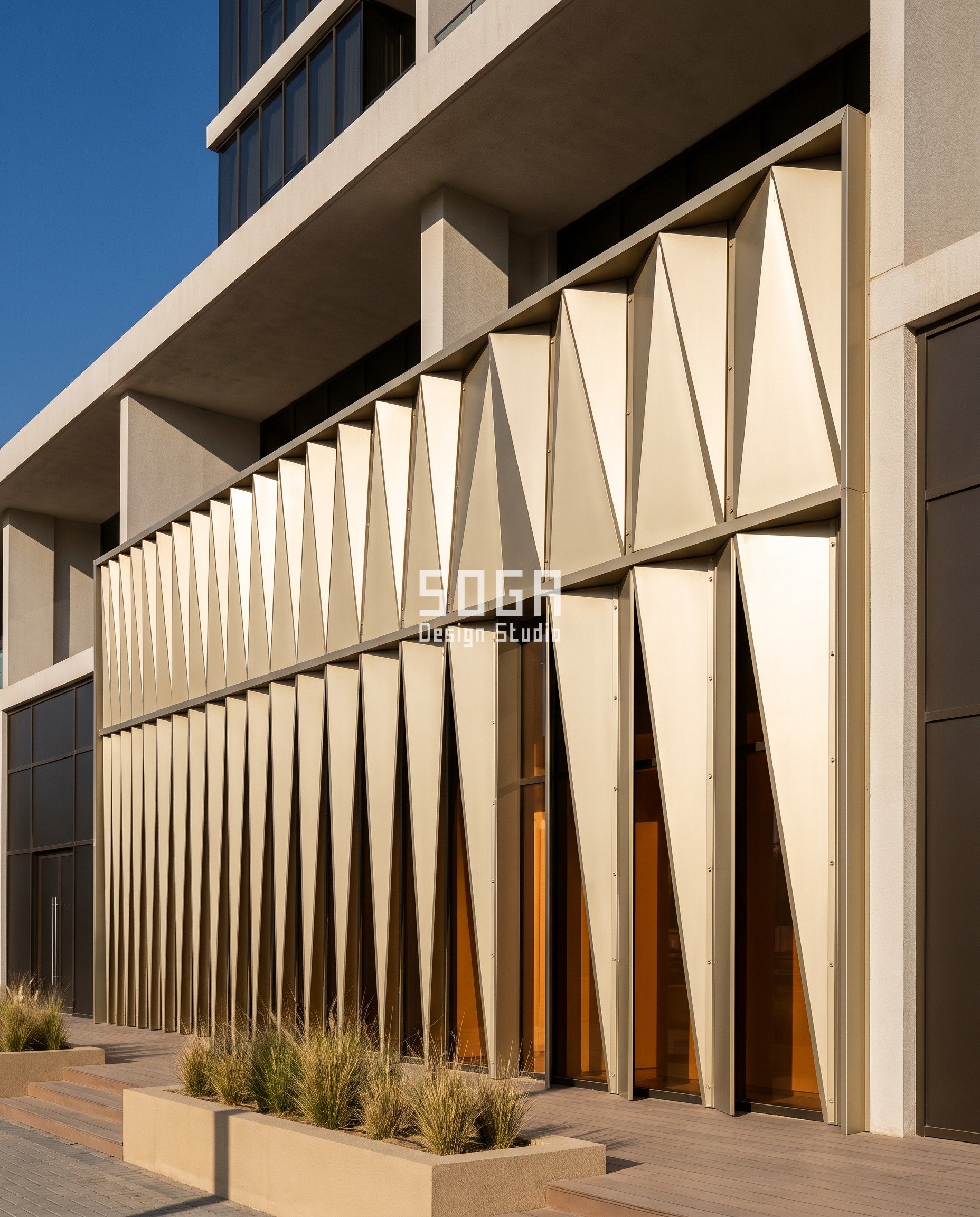 Parametric Unbolt Pleat leased F&B frontage on an Al Wasl Road podium, Dubai - champagne PVDF folded aluminium pleat with ridge pitch coarsening 200 to 900 mm, bolted to the landlord's existing shopfront track