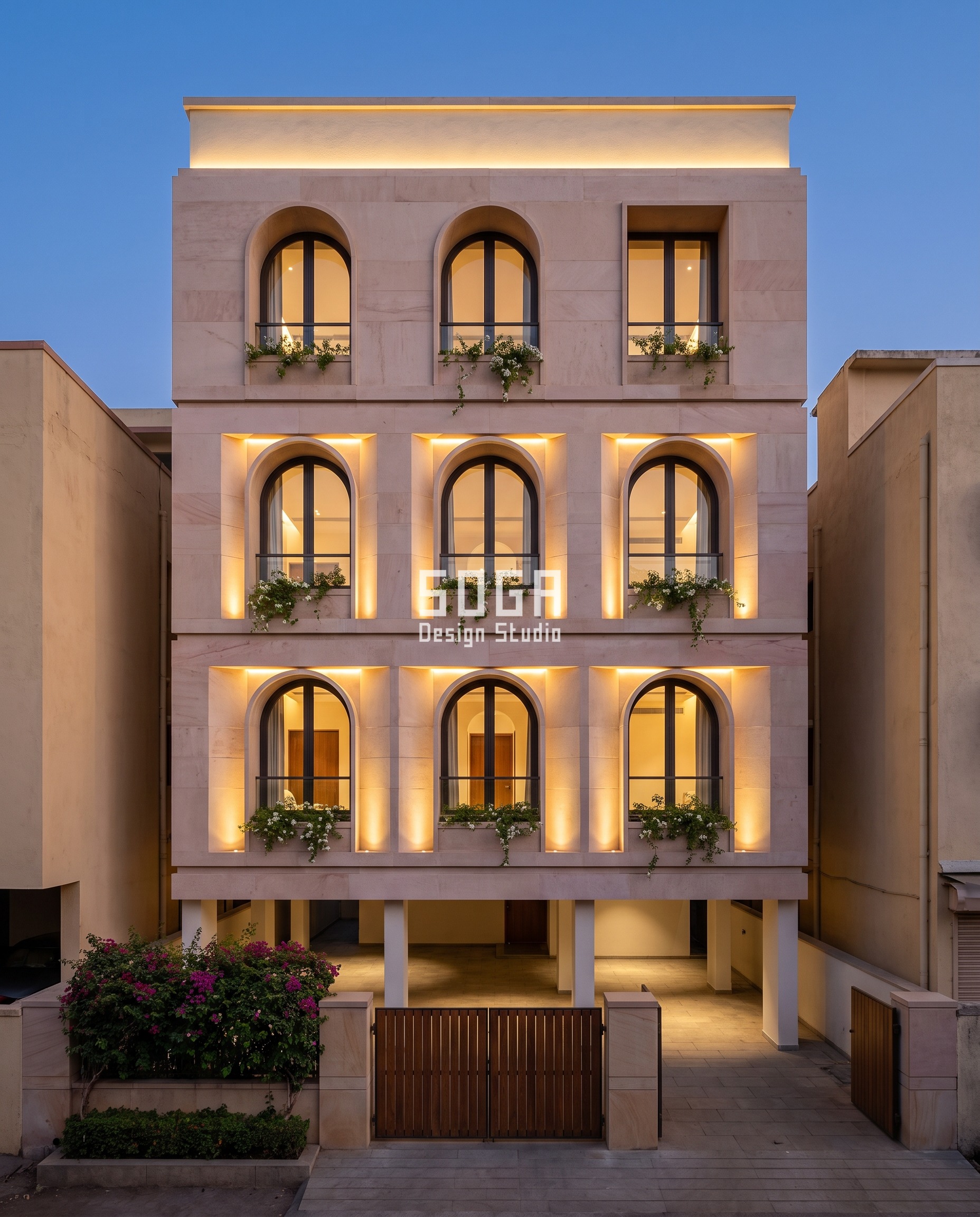 East Facing House Elevation Design India: The 3-Hour Rule 2 East facing house elevation in Satara at dusk: a G+3 Dholpur sandstone residence with nine arched windows whose lit reveals widen floor by floor, plain on the top floor and broadest on the lowest, over an open stilt