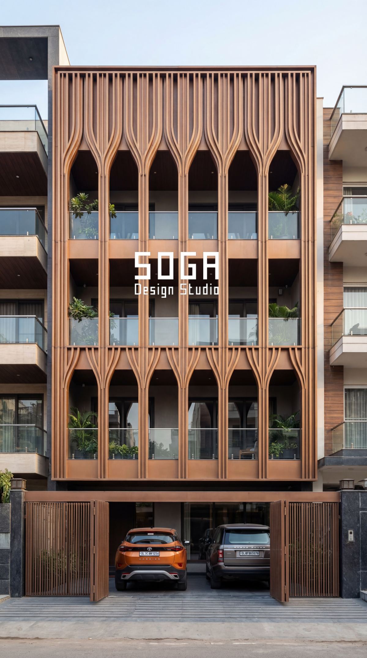 What Makes A Facade Iconic In India? Five Qualities 3 A full-height timber pointed-arch colonnade on an Indian house elevation, one module repeated until it reads as a rule