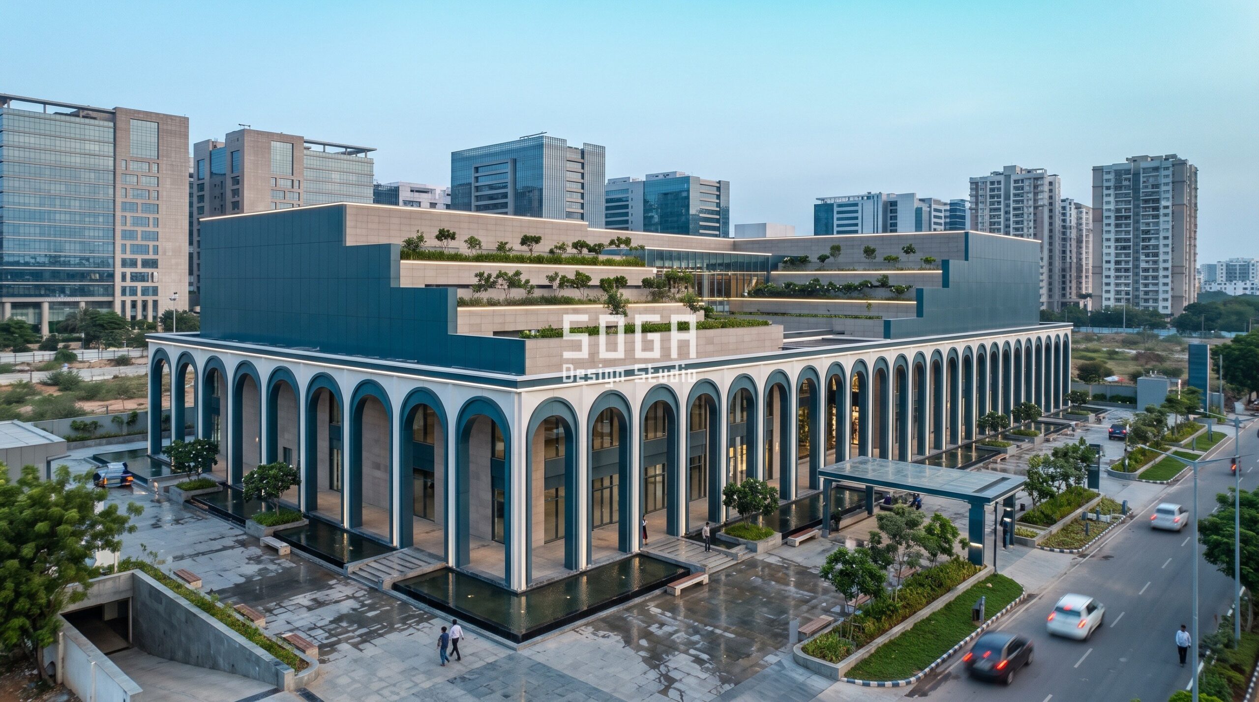 Shopping Mall Facade Design Dubai: The Colonnade Rule 4 Hyderabad: a 38,000 sq m semi-enclosed mall near HITEC City with 900 car and 500 two-wheeler bays. Terraces step from 1.5 m to 6.0 m open to the sky; the 48 m colonnade narrows from 5.0 m to 2.2 m arches, sized to shed monsoon rain arriving at 15 degrees and cut west sun after 4:00 pm in May.