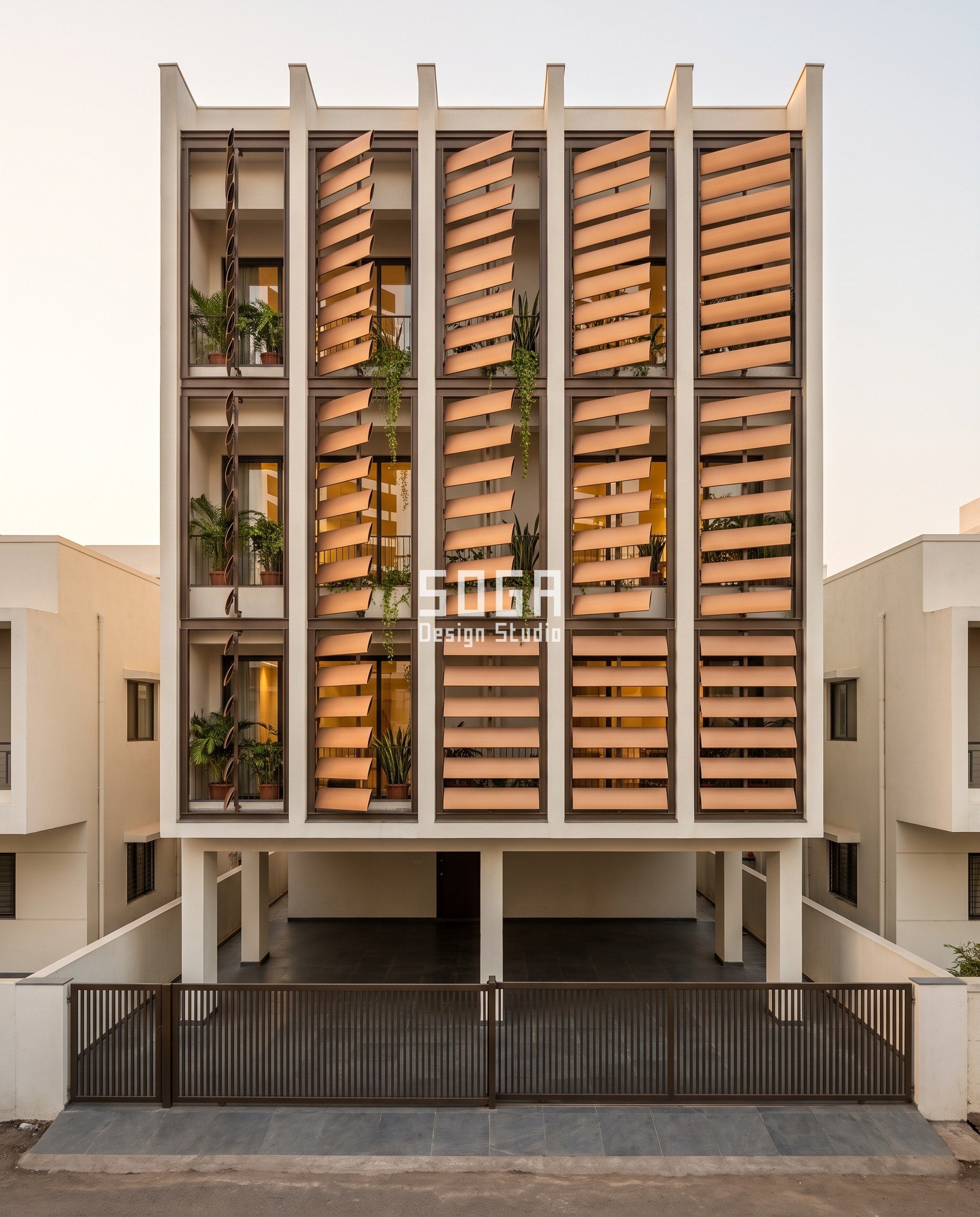 Vertical Fins vs Horizontal Louvers: One Blade, Two Axes 1 Vertical fins vs horizontal louvers compared: SOGA Parametric Pivot Slat horizontal aerofoil louvre facade on a G+4 house in Jalgaon, blade tilt 0 to 72 degrees