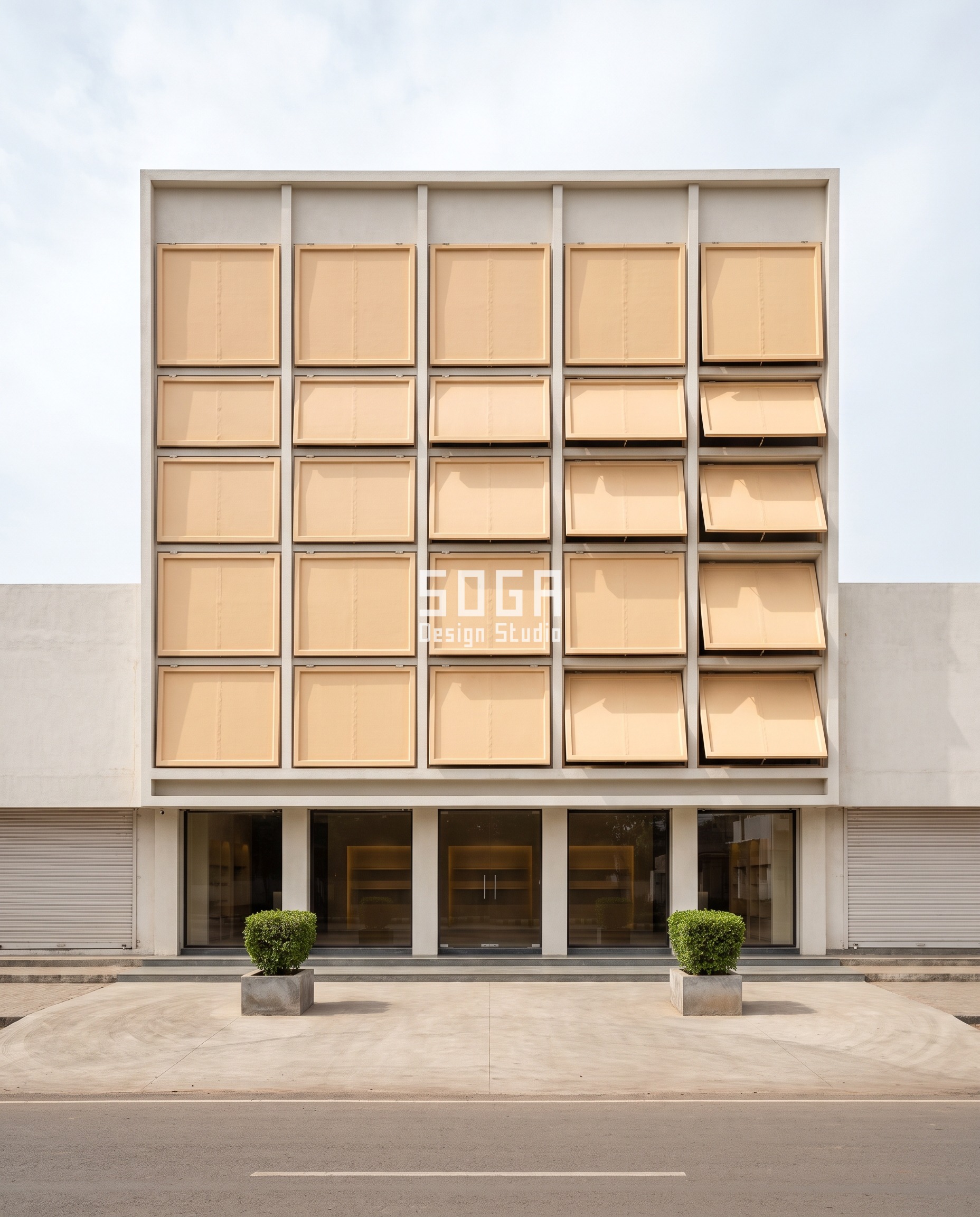 Elevation Design to Reduce Wall Heat: India, Hour by Hour 2 Apricot GRP visor trays on a Jalna boutique showroom, each tray tilted 0, 7, 14, 21 and 28 degrees bay by bay - an elevation design to reduce wall heat that shades the display glass without changing a single tray size.