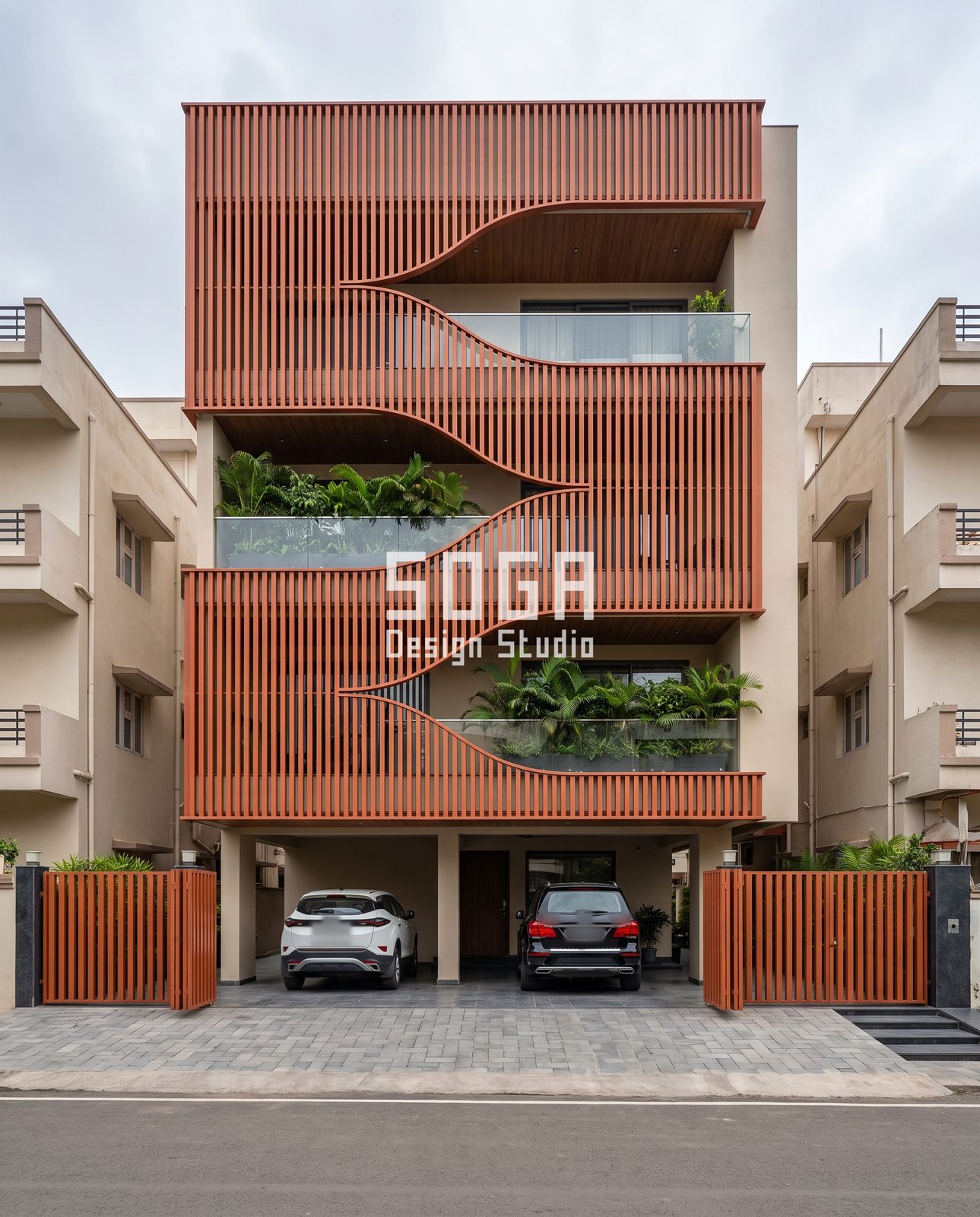 Terracotta-tone vertical slat blocks hanging from a wave-shaped edge beam over planted balconies on a G+3 house in India
