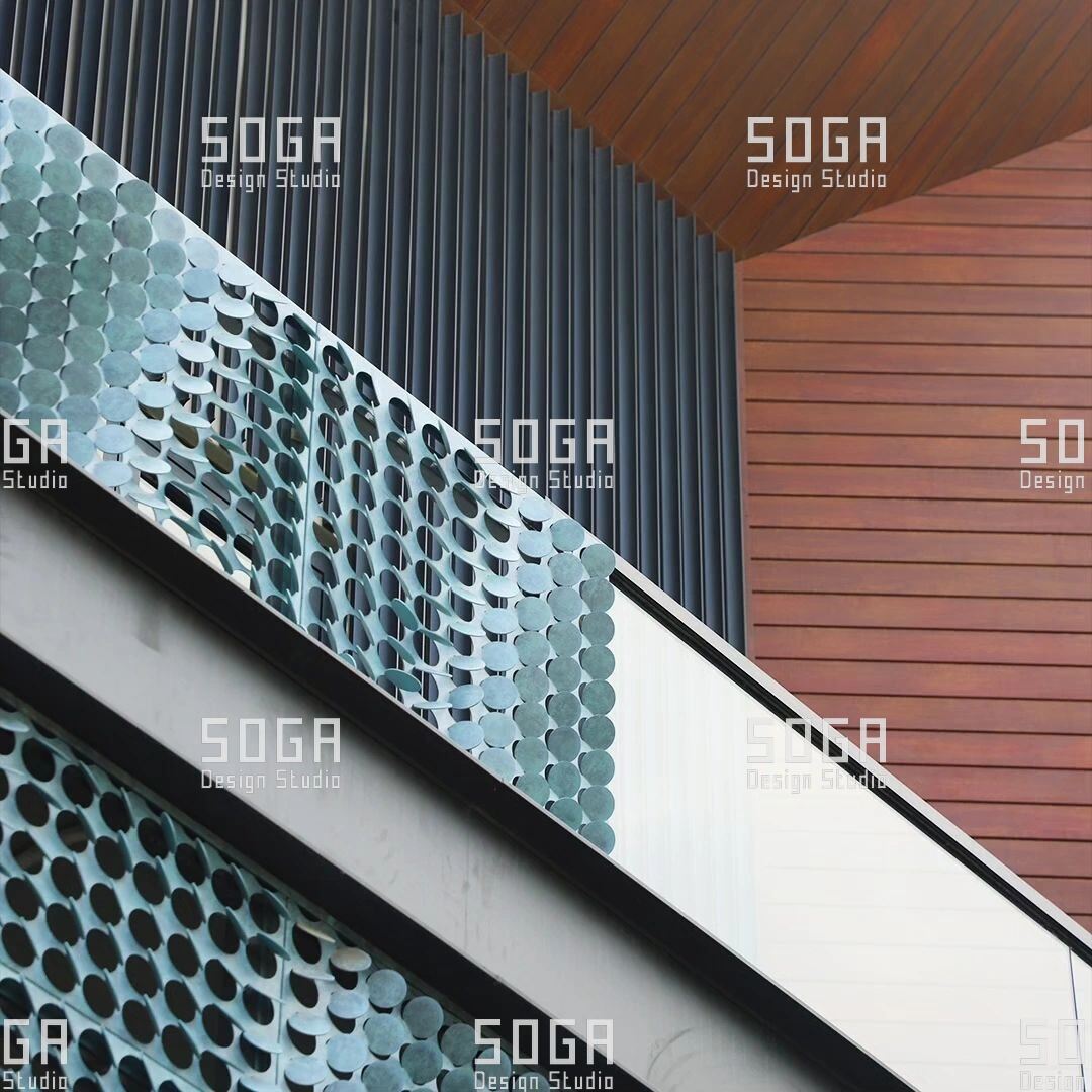 Coin Facade Design: The Parameters That Decide How a Coin Facade Looks 6 Coin facade screen in a cool metallic finish beside a timber soffit, showing how surface finish changes the reading