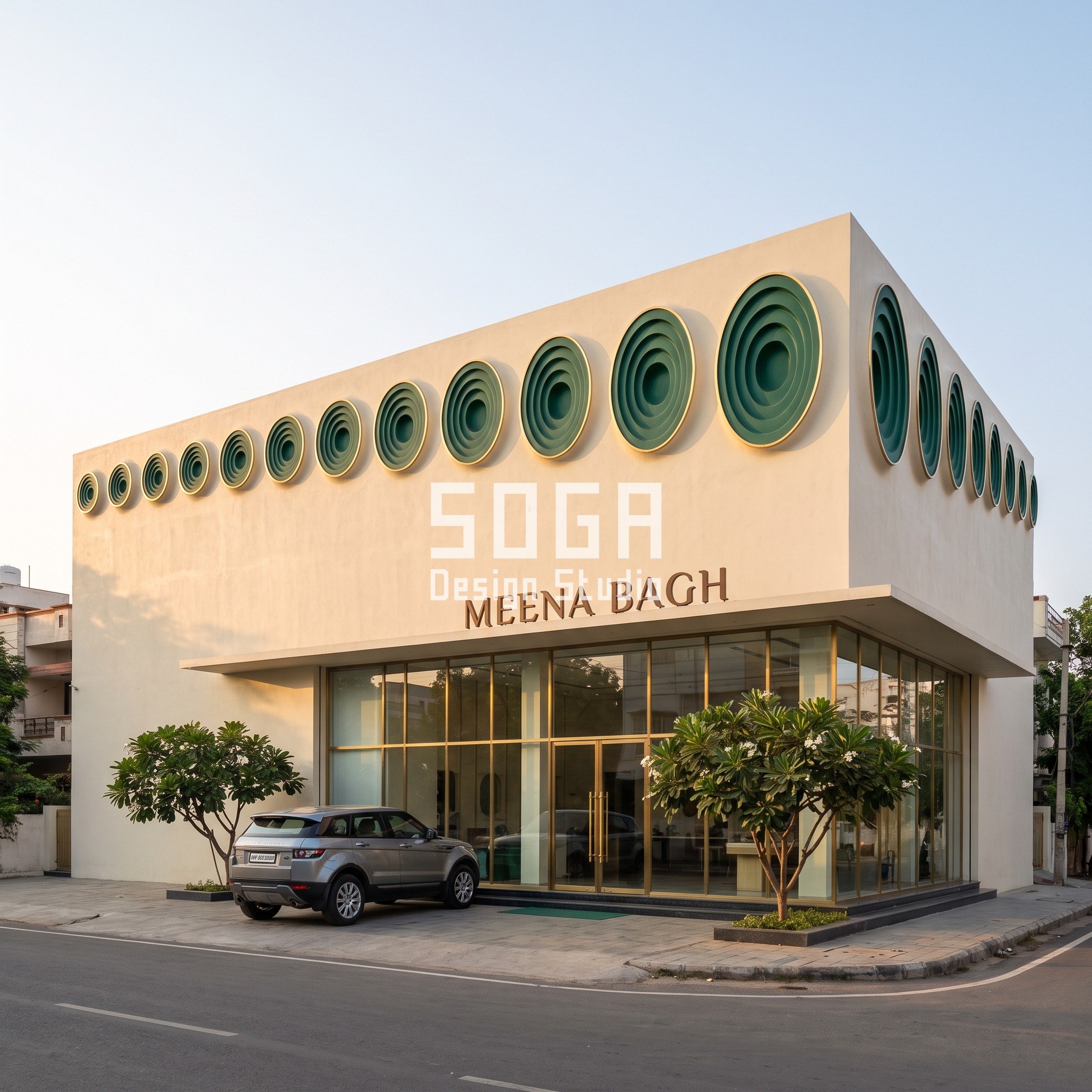 Meena Bagh jewellery showroom facade in Vijayawada with repousse medallion parapet band
